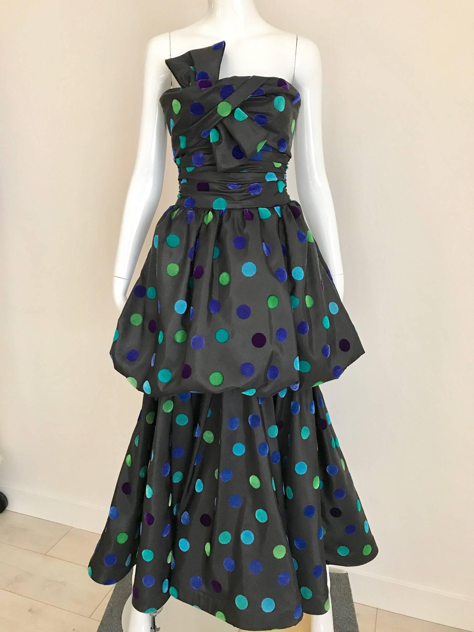 1980s Vintage Nina Ricci Strapless Silk Tafetta  Multi Color Polkadot Gown  featuring Green, Teal and Blue velvet polkatdot. Trumpet Skirt style and small bow.  Perfect for Black Tie Party.
Bust: 34 inch / Waist: 26 inch  / Dress Length: 54.5