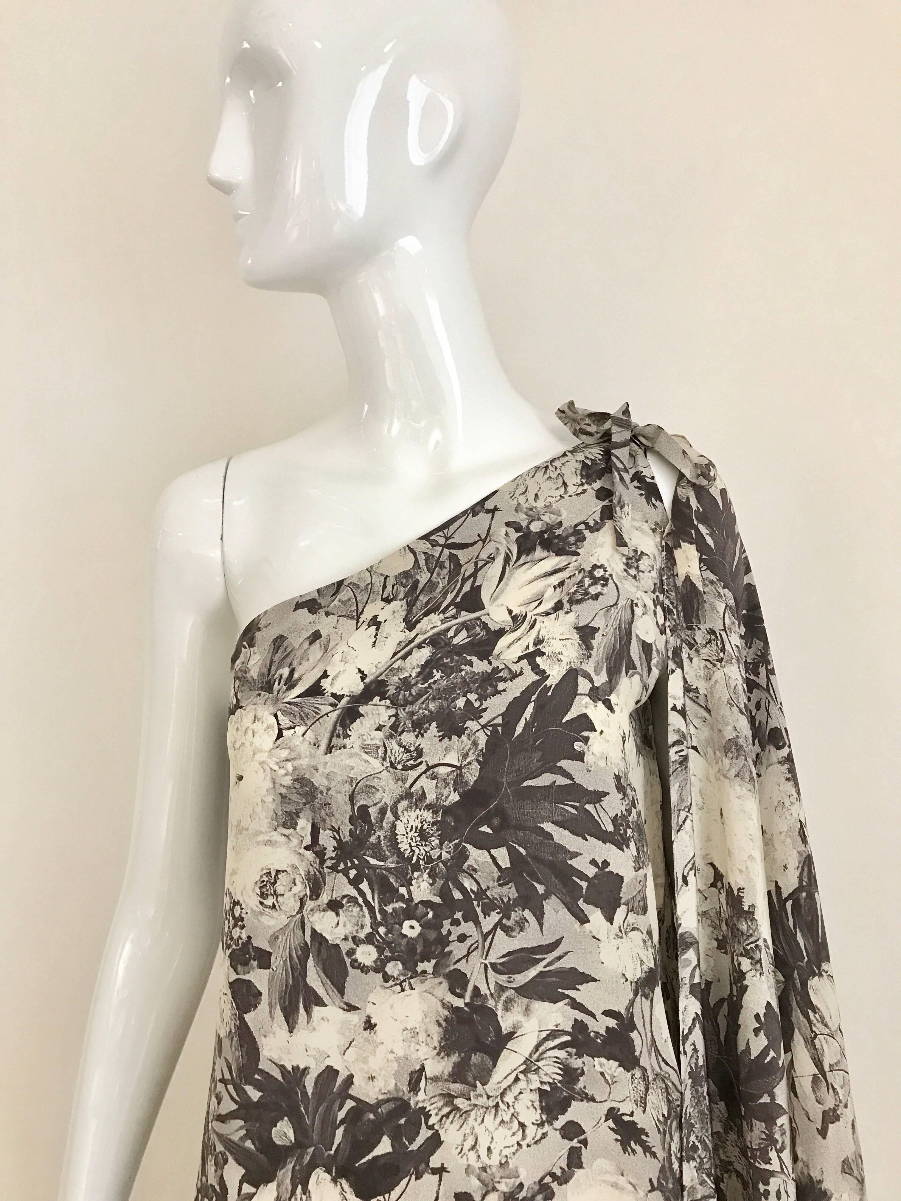 1970s Jean Patou Grey Floral Print Silk One Shoulder dress.
Size 4/6