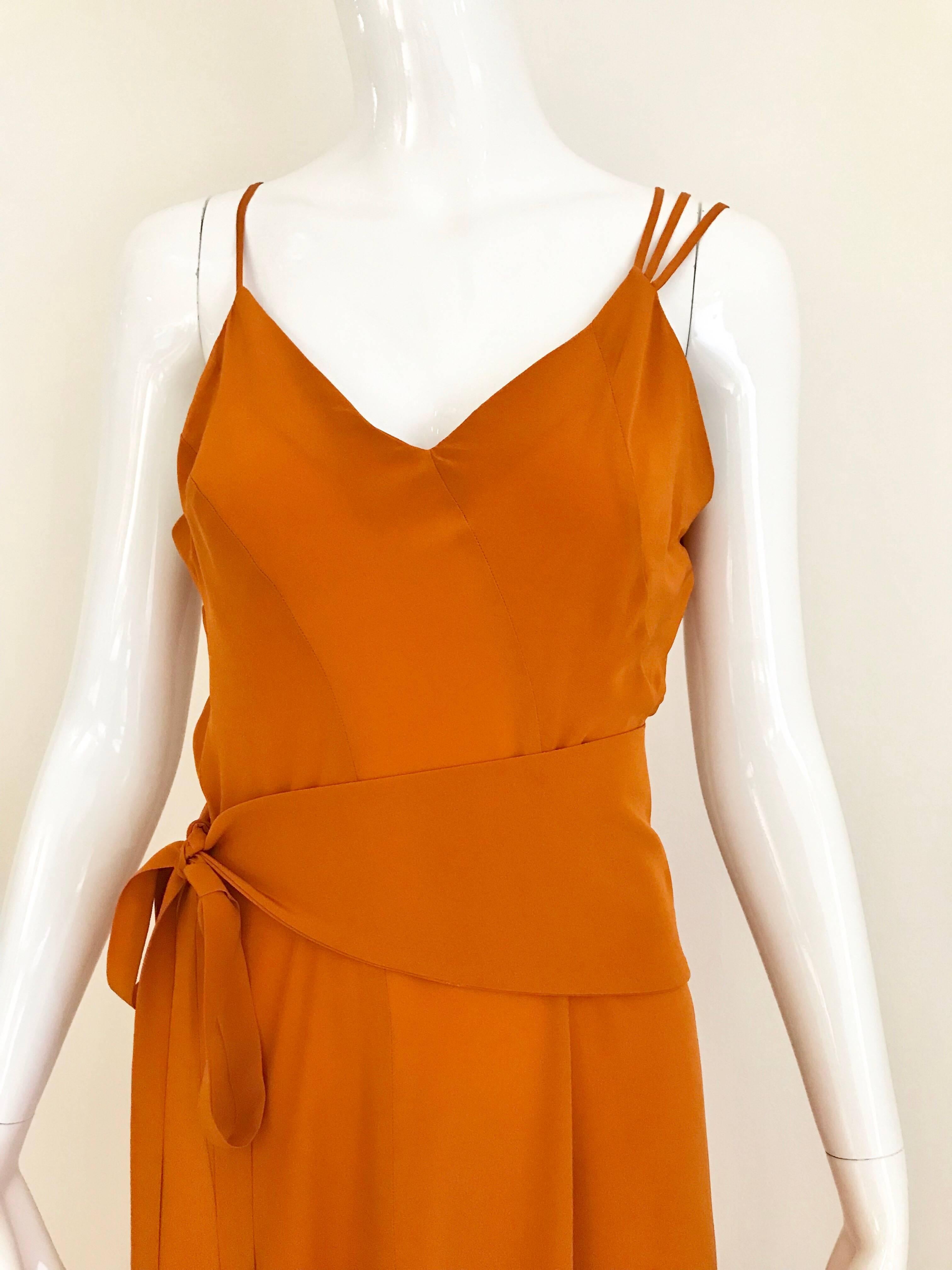 Sexy and elegant 1990s KENZO orange silk dress with silk belt.
Size 4/ Small
**** This Garment has been professionally Dry Cleaned and Ready to wear.
