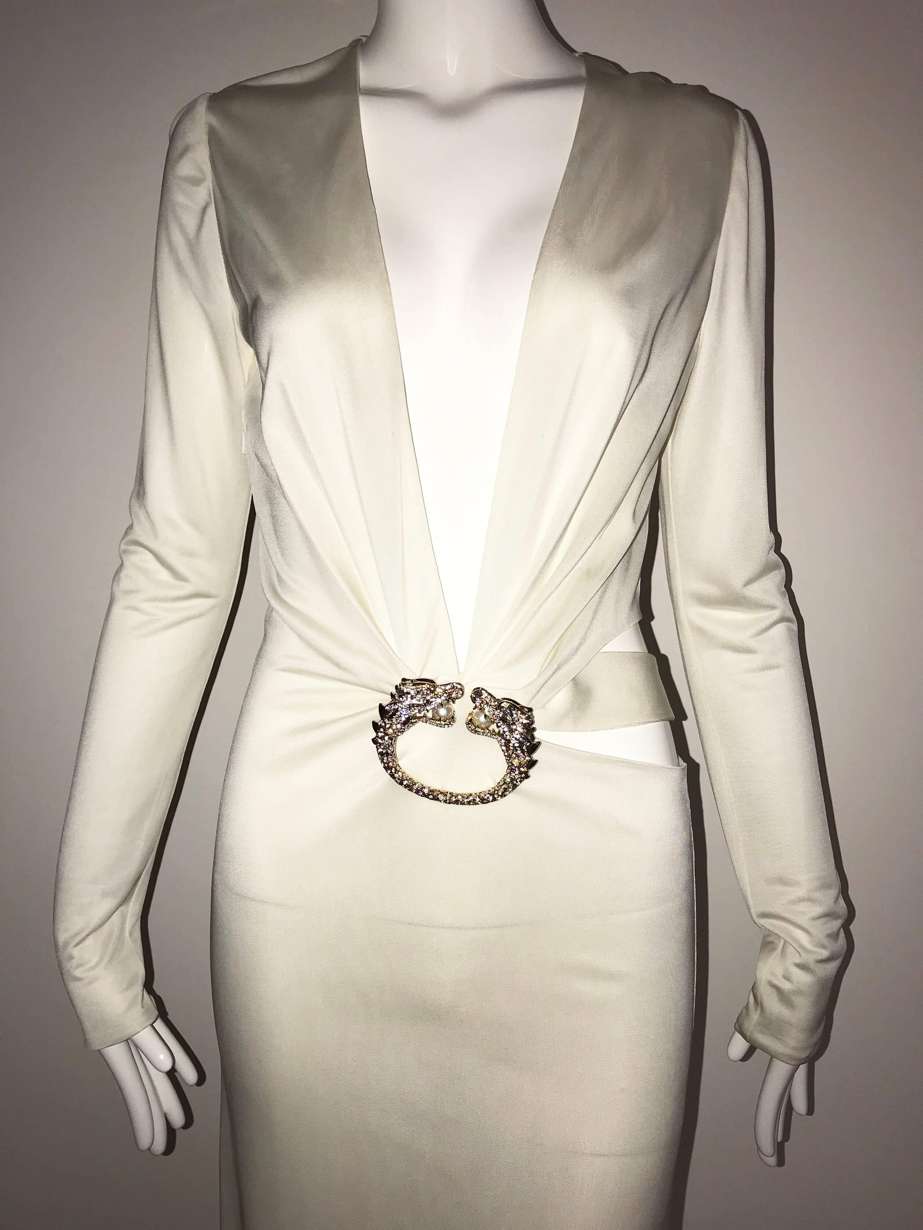 Sexy Gucci White Matte Jersey Gown designed by Tom ford. Plunging Neckline and bare back! Perfect gown for Holiday party. Marked size 40 italian and it fit best for size US 4 or 6. 
Dress is only worn once.