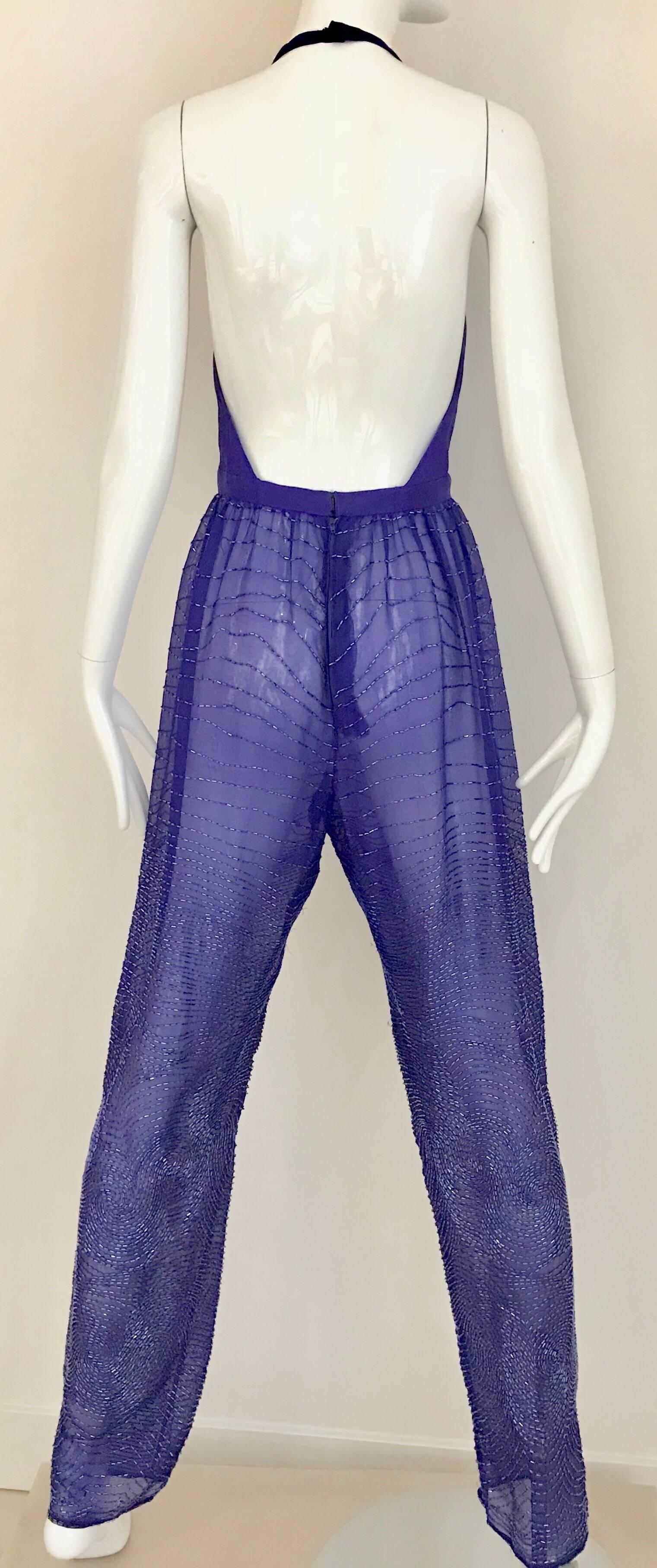 Iconic Studio 54 Sexy Vintage 1970s Purple Violet Halston Silk Jumpsuit with beads with bare back. 
Size 4/. 
Waist: 26 inches/ Bust: 36”/ Hip: 36”

**small tiny holes see pictures attached