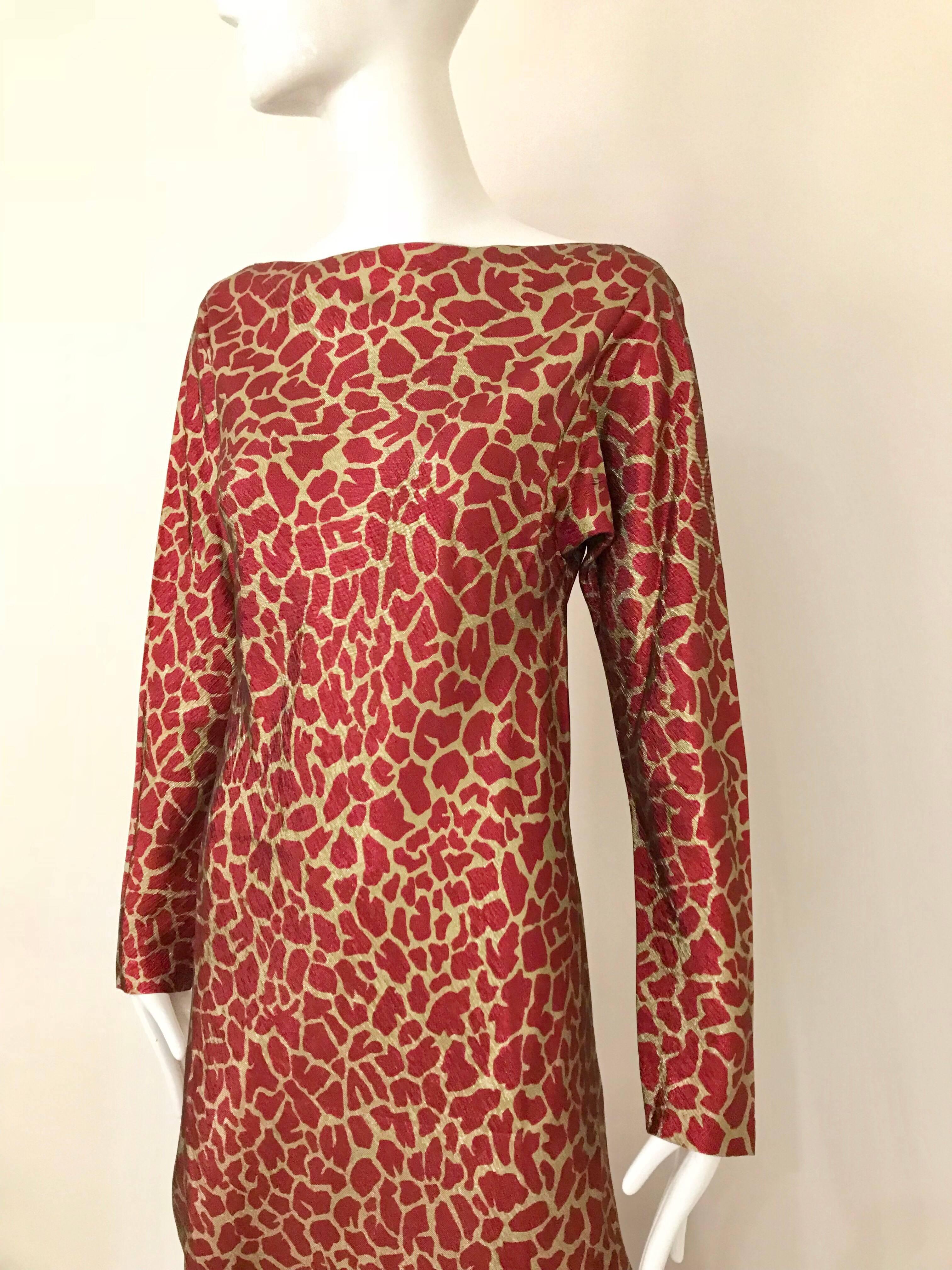 1970s Classic HALSTON Bias Cut red and gold metallic animal  print long sleeve long dress. Slip on Dress. 
Size: 6 - 8  Medium
Bust: 36 inches/ Waist: 39 Hip: 40 inch
**** This Garment has been professionally Dry Cleaned and Ready to wear.

