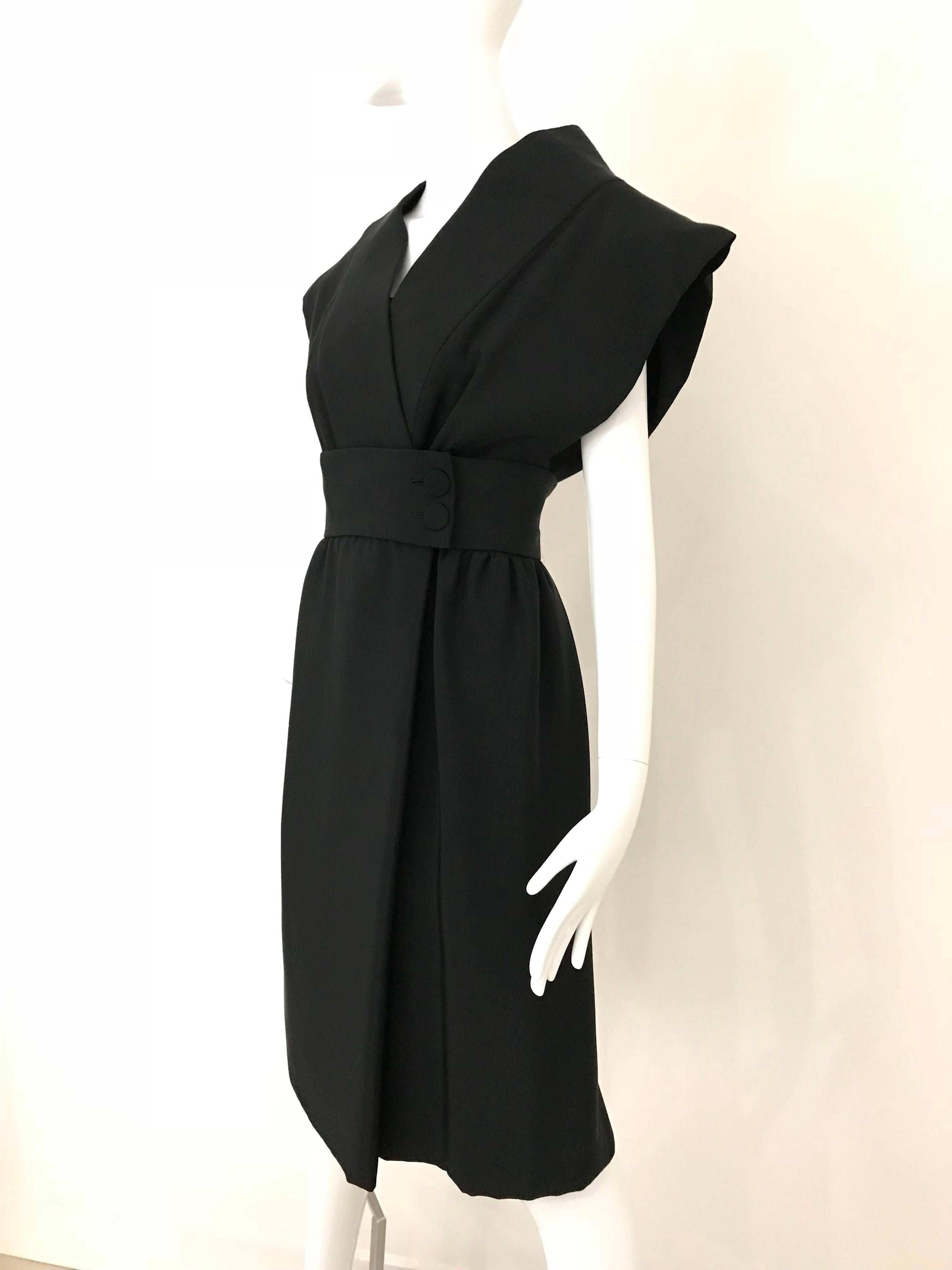 Important Norman Norell Couture black Silk Obi Cocktail Dress. 
The museum of FIT will exhibit Norman Norell clothing in February. 

Fit size 4/ Small
Bust: 34-36  inches
Waist: 26 inches