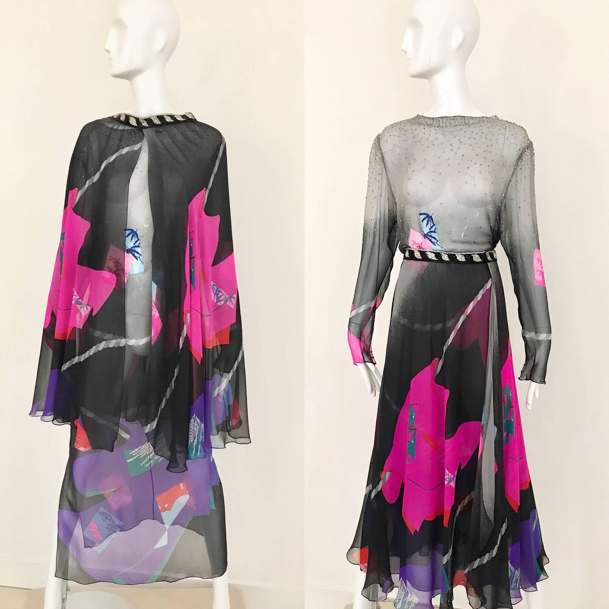 This 80's Hanae Mori ensemble is very elegant with it's black silk chiffon with pink abstract print work. It is very versatile, as the skirt can be worn as a cape which changes the feel of the 2 piece ensemble. The waist of the skirt has a special