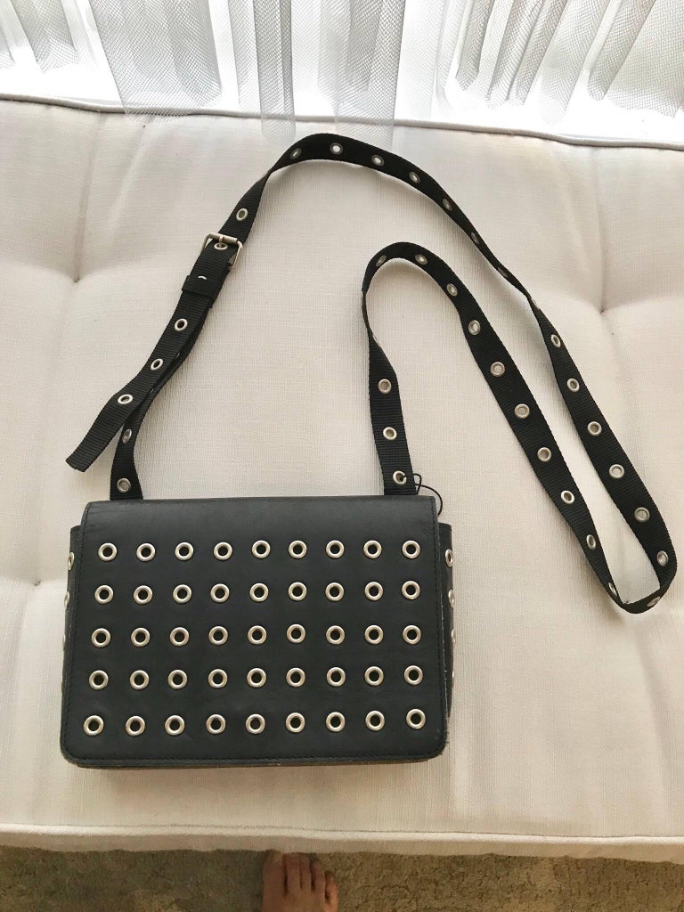 Comme des garçons Black Leather Grommets Purse For Sale at 1stDibs