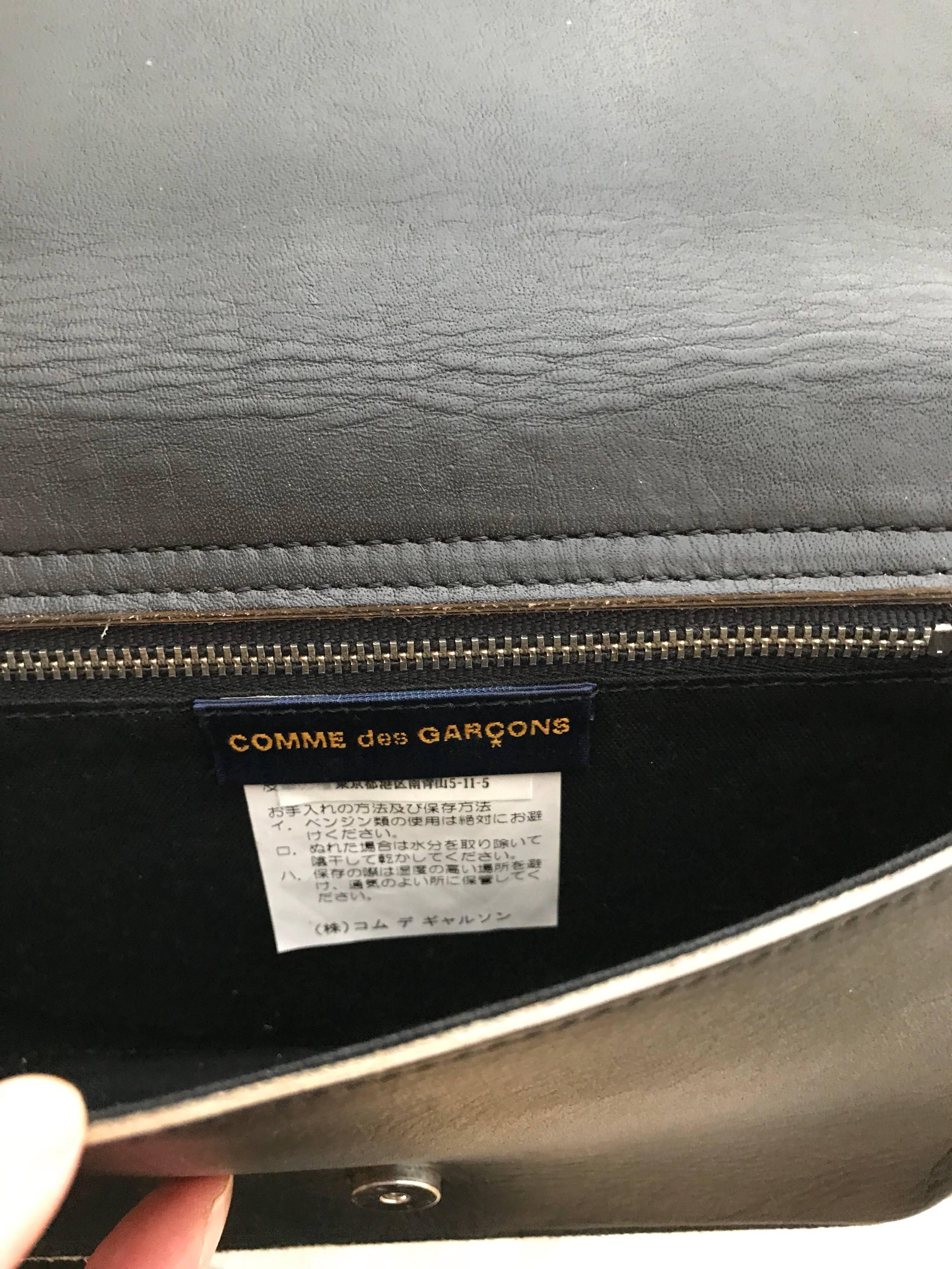 Comme des garçons Black Leather Grommets Purse In Good Condition For Sale In Beverly Hills, CA