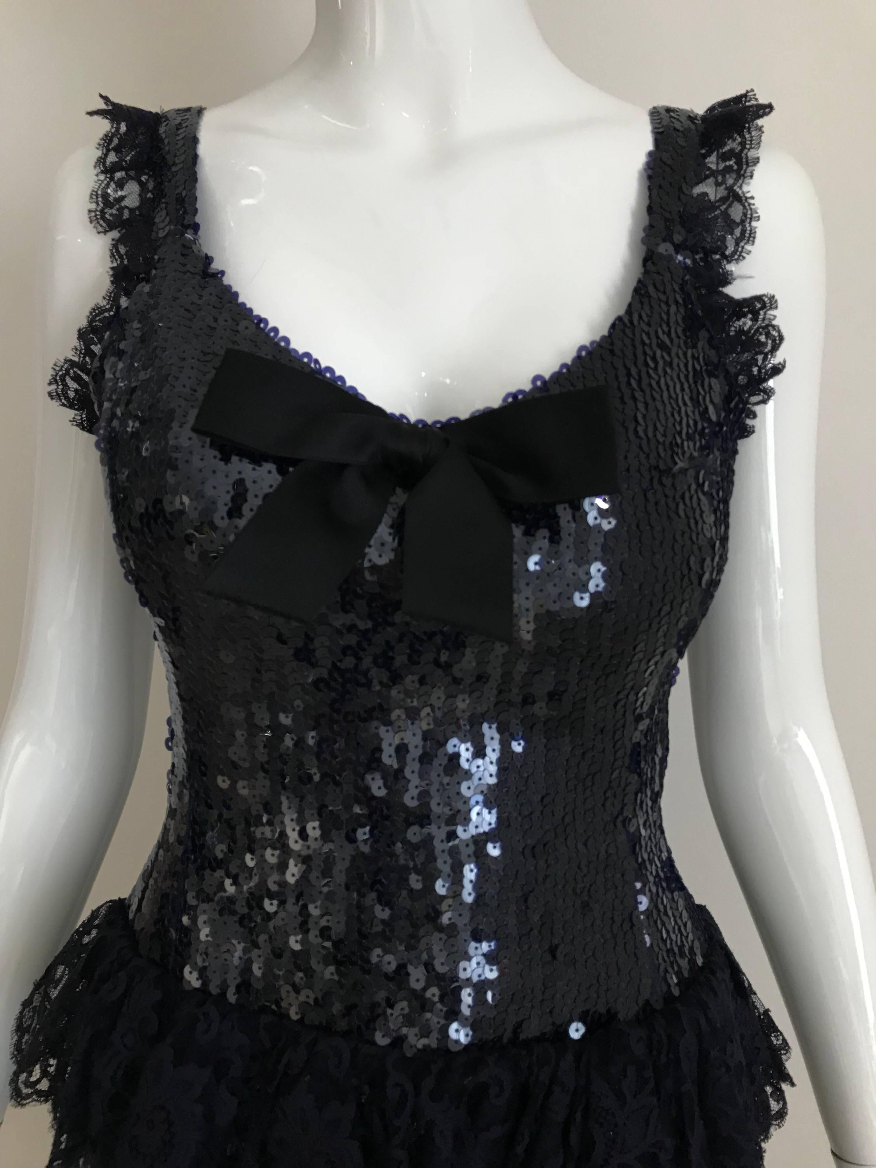 Vintage Navy Blue CHANEL sequin cocktail dress with lace. 
Size: 2/Small 