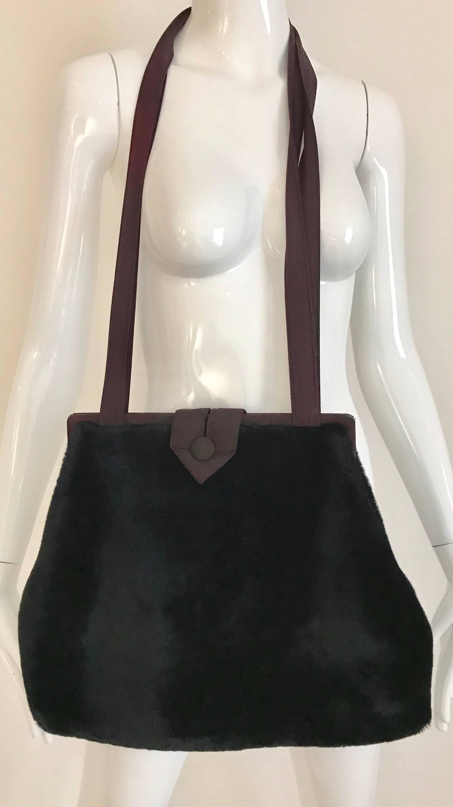 1980s vintage Norma Kamali Large faux fur shoulder bag
Measurement: 17 inches width ( the widest part) see images for measurement
***see small flaws ( last picture attached)

