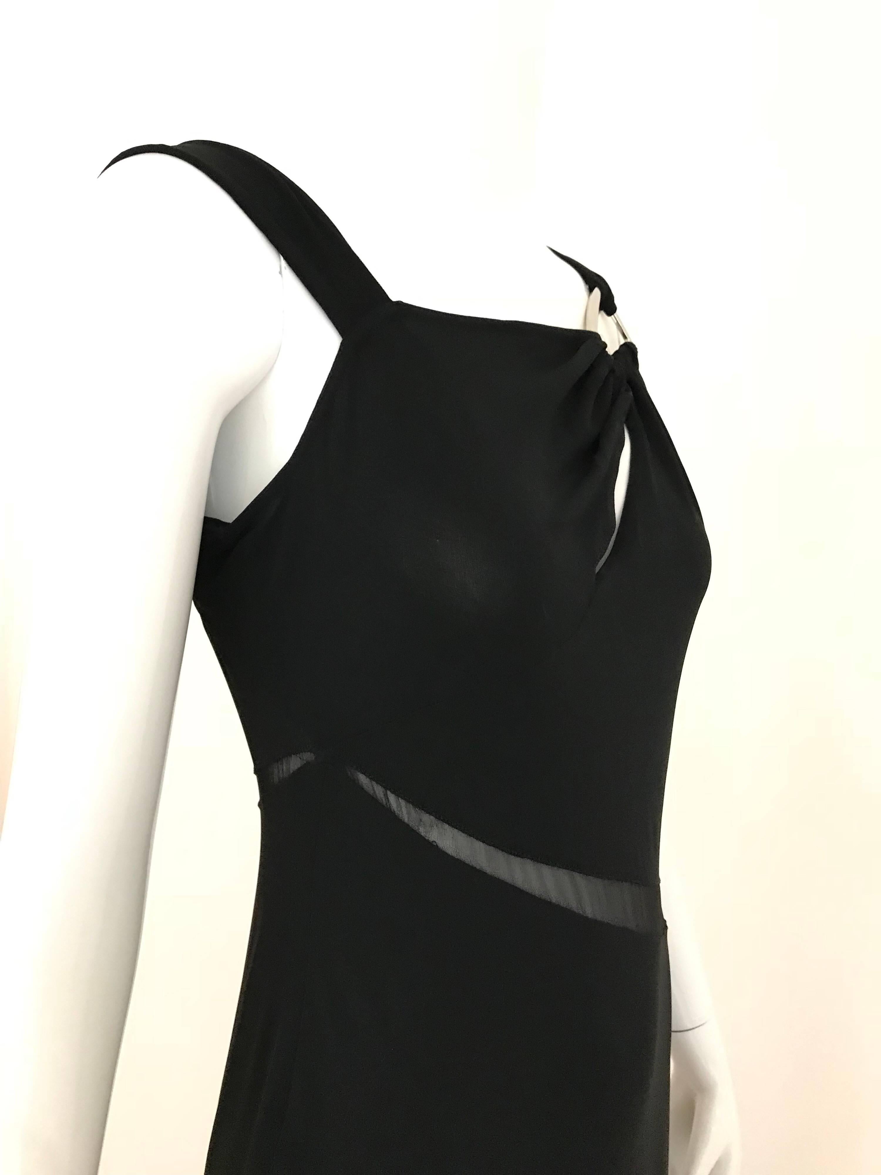 Vintage Claude montana black silk and jersey cut out gown.
Small -  Medium
Bust 36 inches