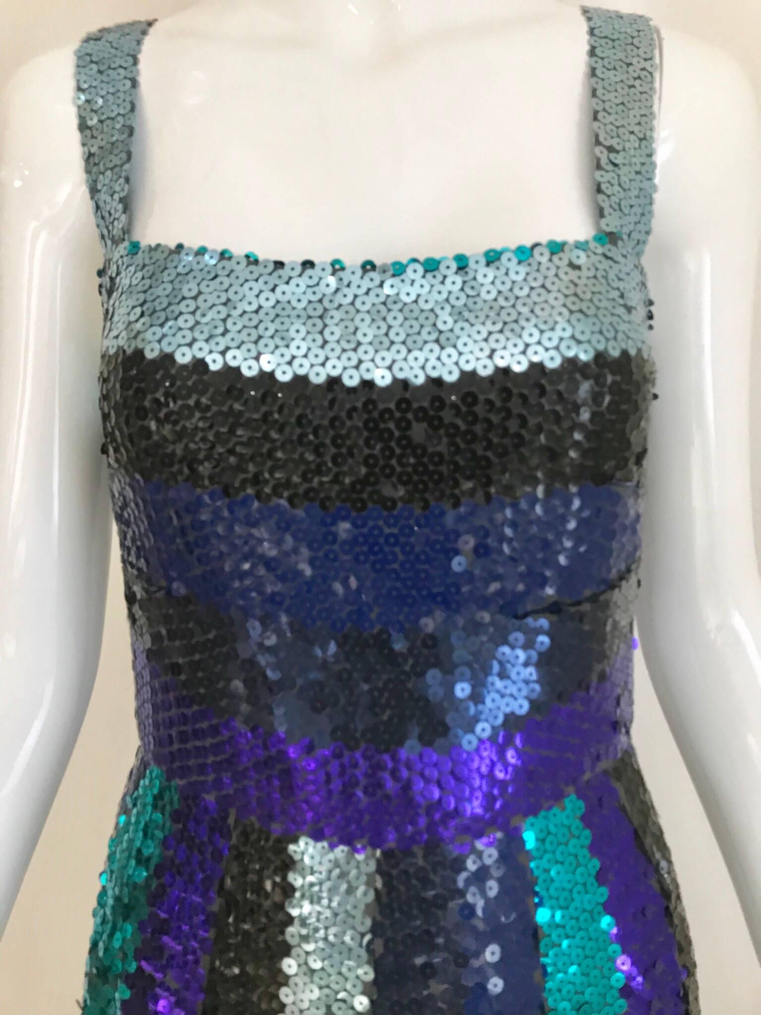 Beautiful Vintage Givenchy late 60s cobalt blue,green and purple spaghetti strap cocktail dress completely covered in hand stitched sequins. Very flattering fit with nipped waist and sort of flair skirt. Fun party dress! Perfect for Birthday party
