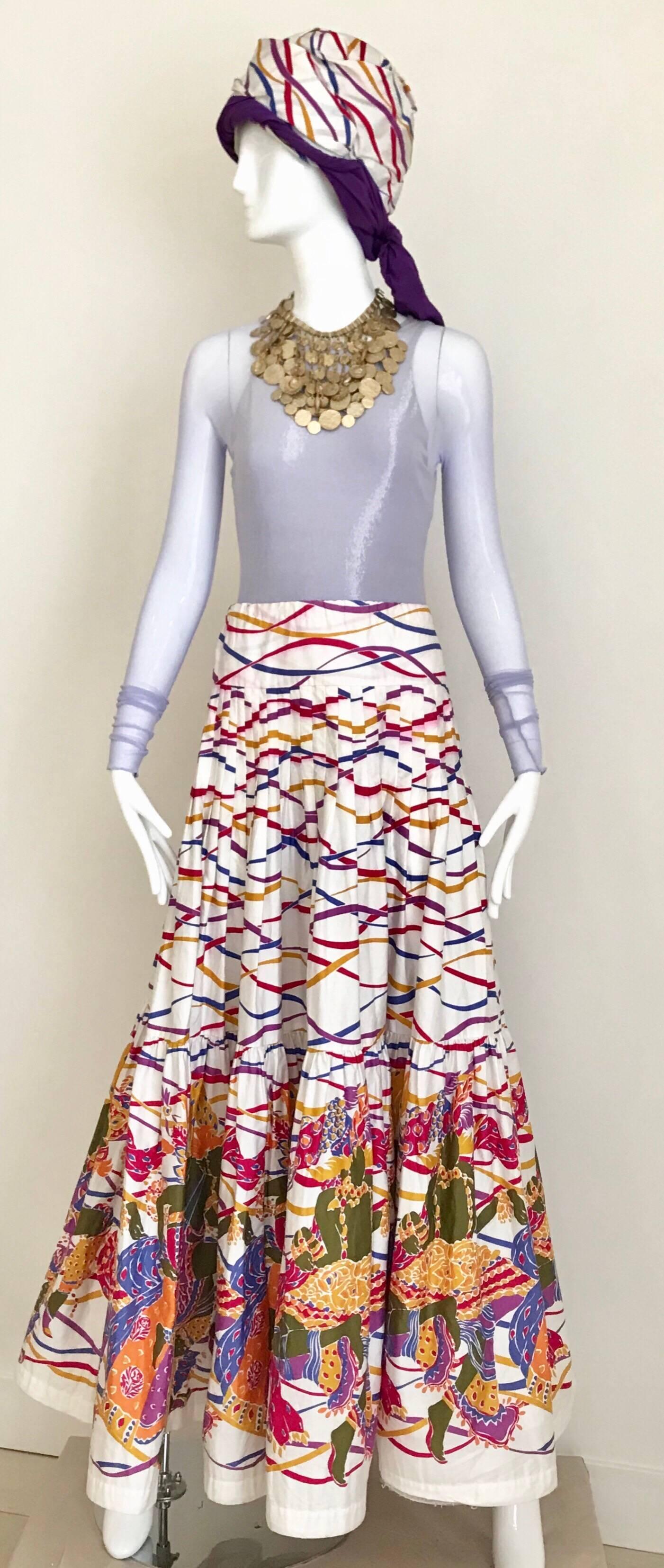Beautiful Vintage Saint Laurent rive gauche designed by Yves saint laurent white print cotton maxi skirt and turban. size: MEDIUM 
Skirt measurement: waist: 32 inches
** body suit is Giorgio di sant angelo available for purchase