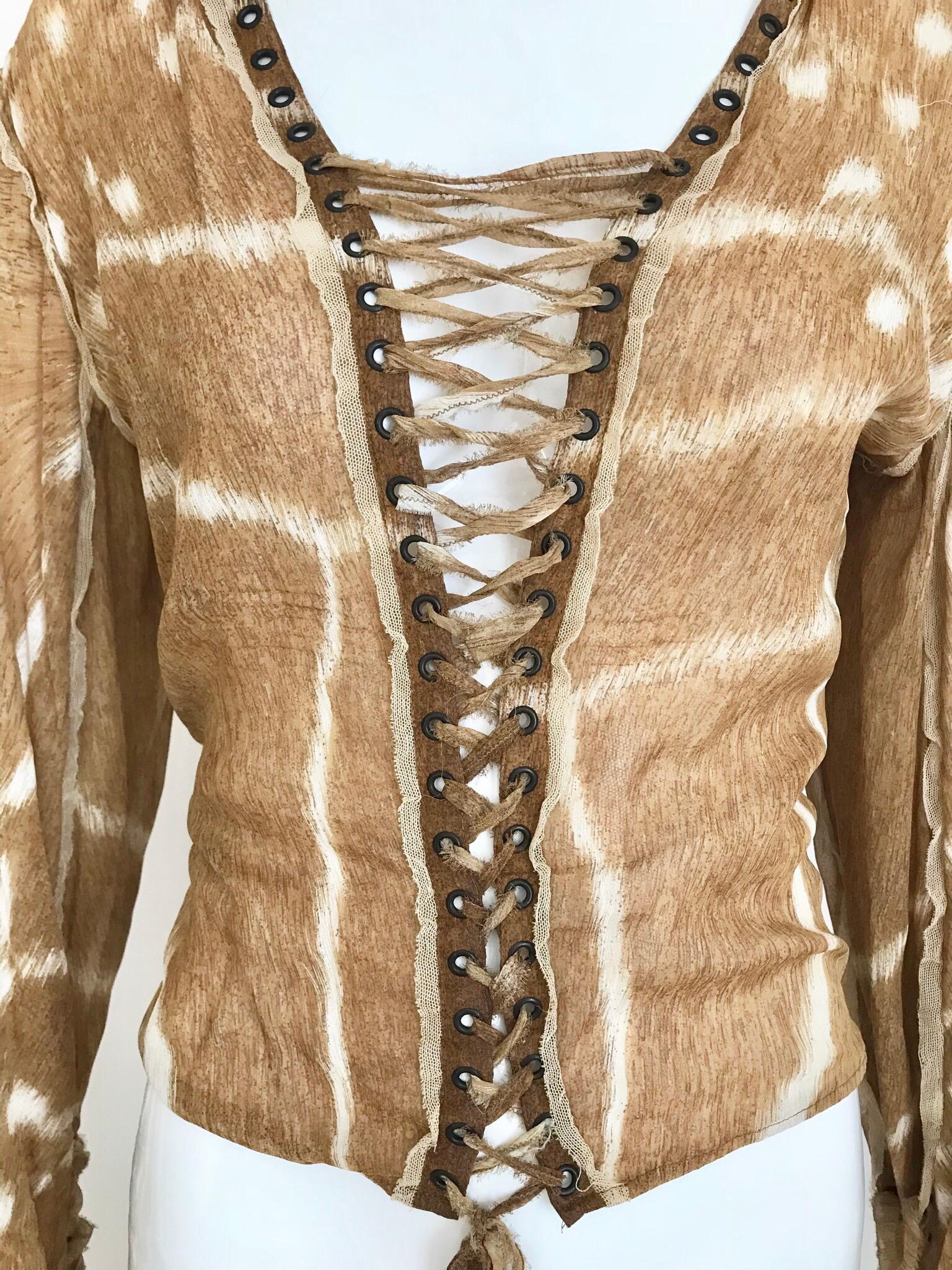 2002 Yves Saint Laurent Silk Brown and white animal print lace up blouse by Tom Ford era. 
Khaki YSL skirt sold separately.
Blouse is adjustable. Fit US 2/4/6 
Bust: 34