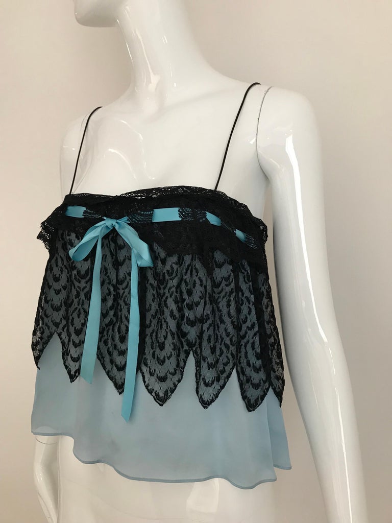 Sexy 2000s YSL by Tom Ford light blue silk spaghetti camisole strap blouse with black lace trim.
Bust: 32' to 34 inches . Fit US 4/6
**** This Garment has been professionally Dry Cleaned and Ready to wear.
