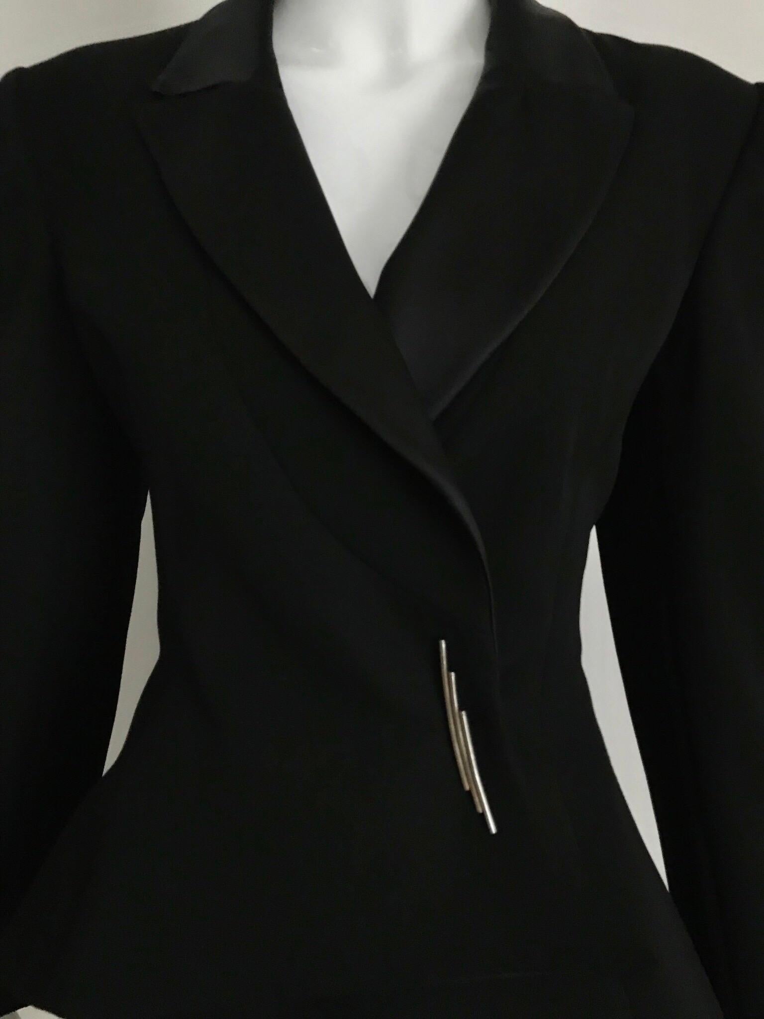1980s Black Claude Montana asymetrical  peplum Jacket. Jacket has satin lapel.
Bust: 36 inches/ Waist: 30 inches
**label has been removed
**** This Garment has been professionally Dry Cleaned and Ready to wear.

