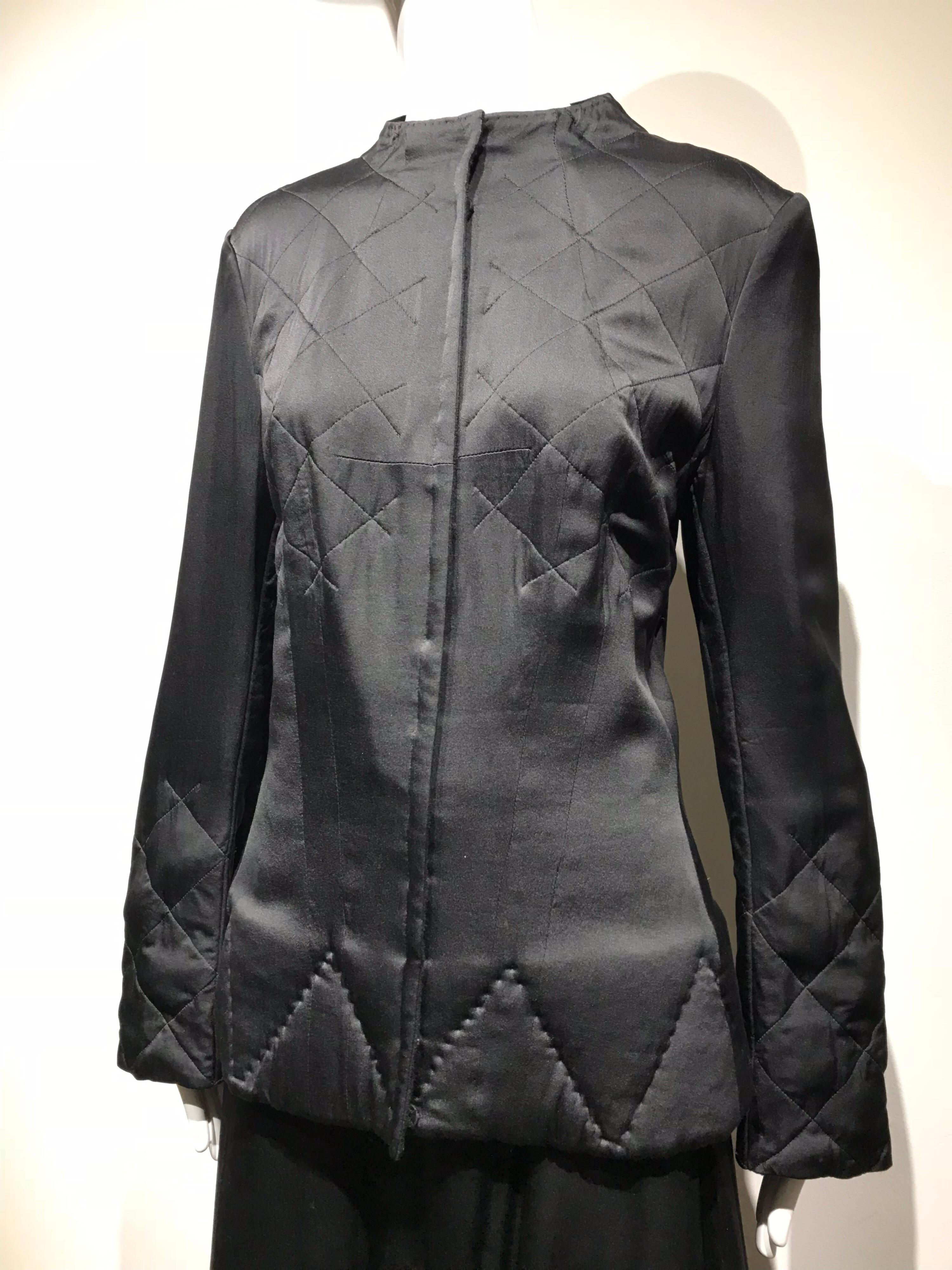 Vintage Yohji Yamamoto Black  Silk quilted jacket with maxi skirt.  Jacket lined in wool. Very Elegant and understated set. Perfect for evening cocktail event for winter. 
Skirt has 2 pockets.  Size: Medium
Measurement:
Jacket bust: 38 inches/