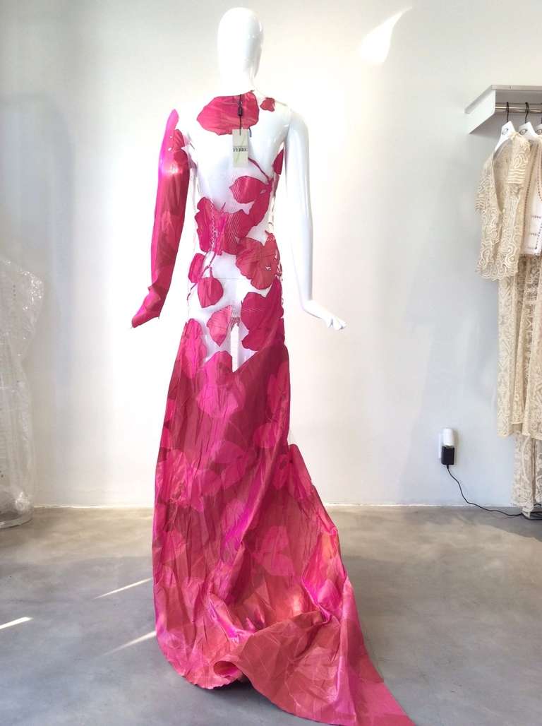 Rare Dead-stock Vintage Gianfranco Ferre Spring 1999 runway gown Fushcia silk floral applique gown. This gown is made of silk applique on sheer net fabric. Long sleeve and zip on the side. Museum Quality and perfect for vintage collectors.  Fit US 4