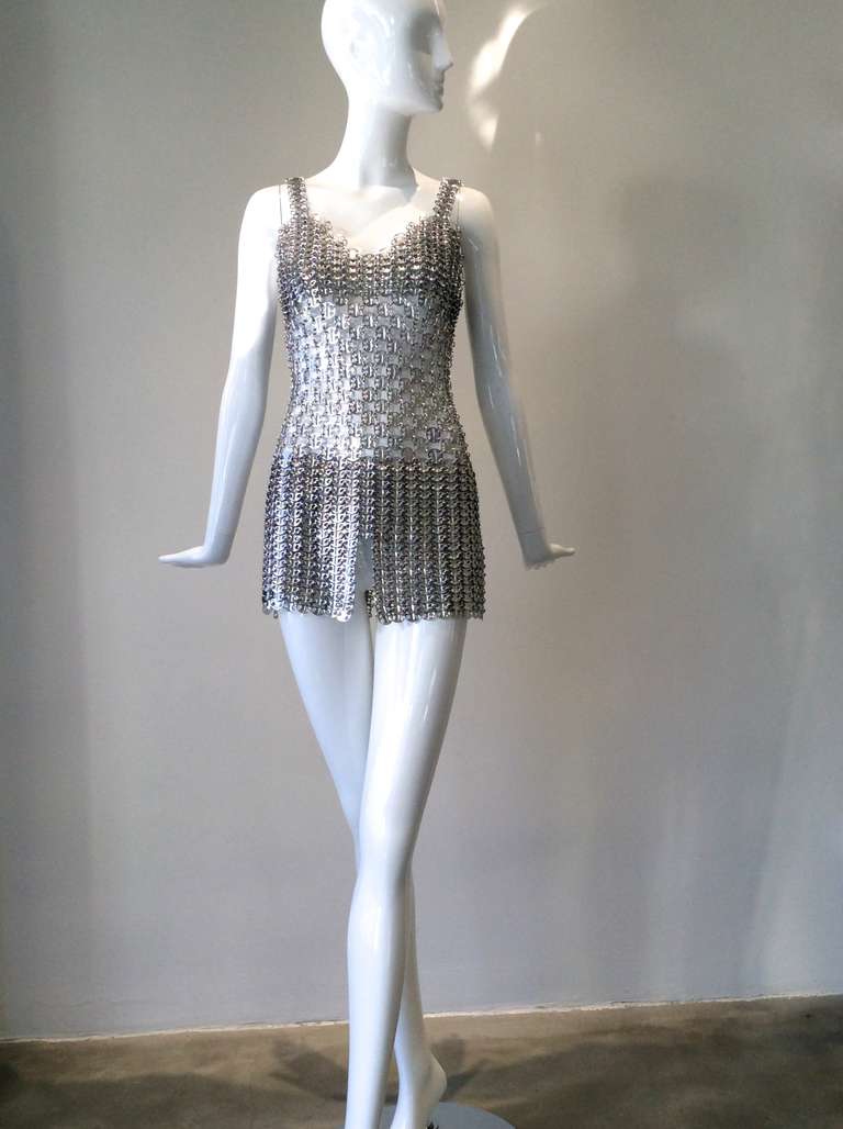 INCREDIBLE  one of the kind Paco Rabanne museum piece.
Aluminum tunic top c.1960s. Excellent condition.
fit modern size 2 or 4.