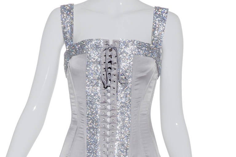 From Milan- Spring 2004 Dolce & Gabanna Gorgeous Grey Silk Charmeuse Rhinestnes corset dress.
Size : Small: 2