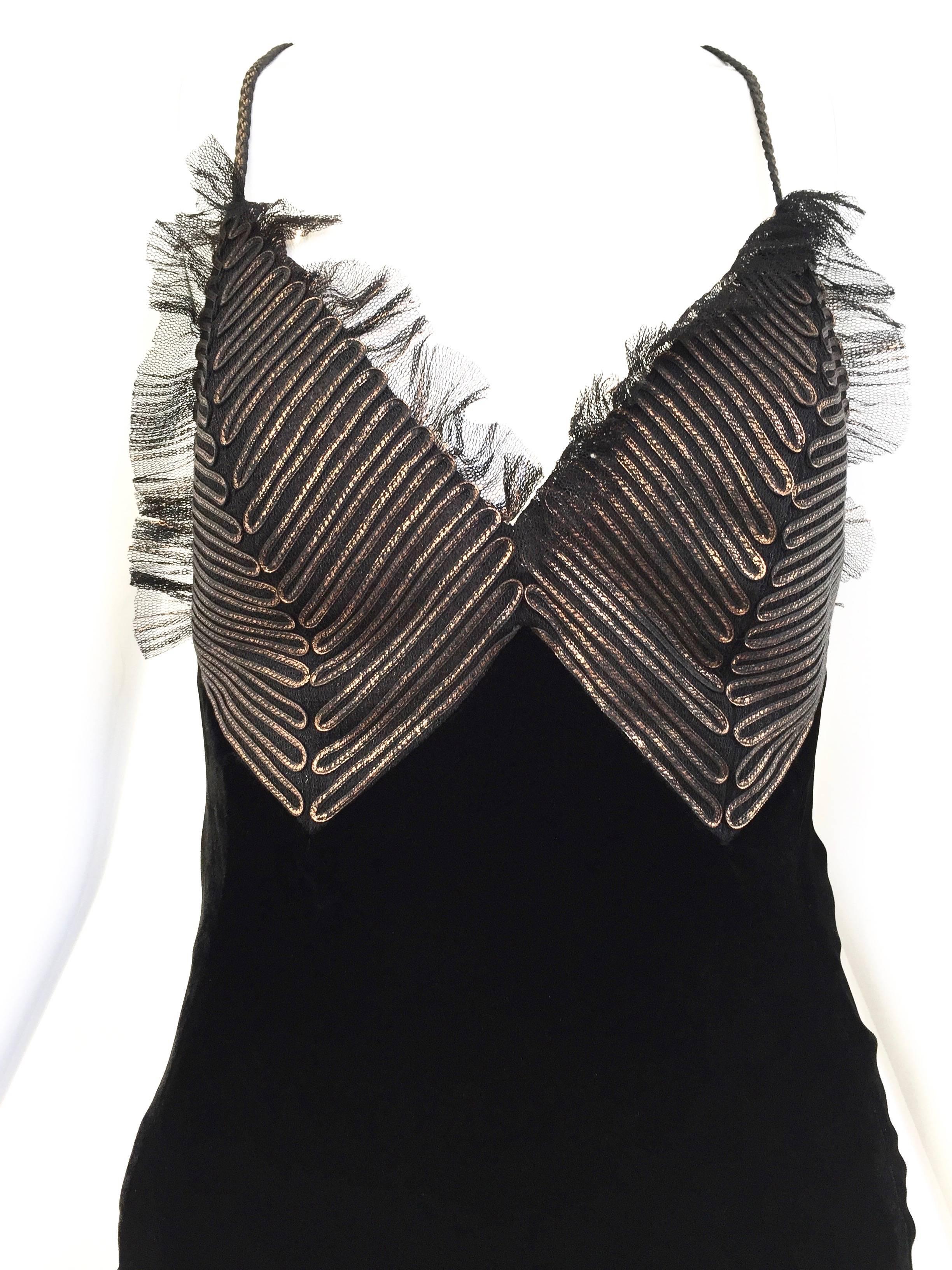 Stunning! Jean Paul Gaultier velvet bias cut gown and bronze metallic bodice.
Bust: 32
Waist: 26
Hip: 34
Size :XS/Small

