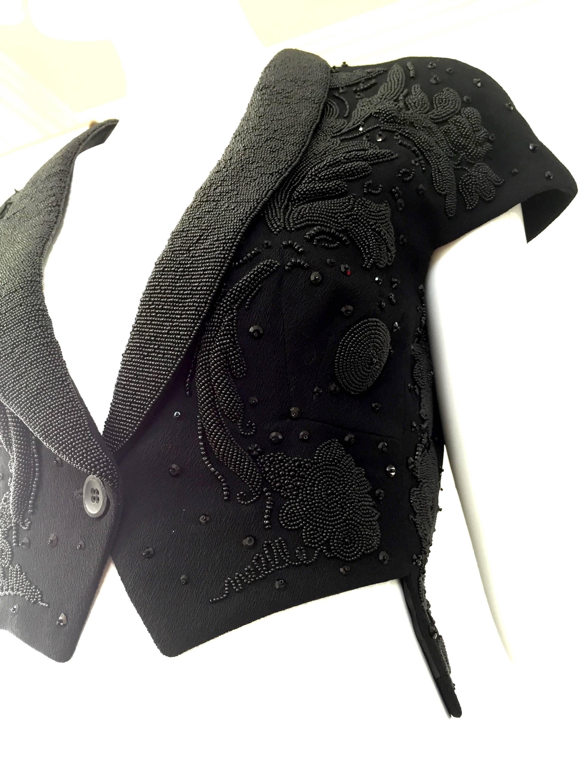 Jil Sander black beaded embroidered crop top-Jacket.
lined in silk
Bust: 34