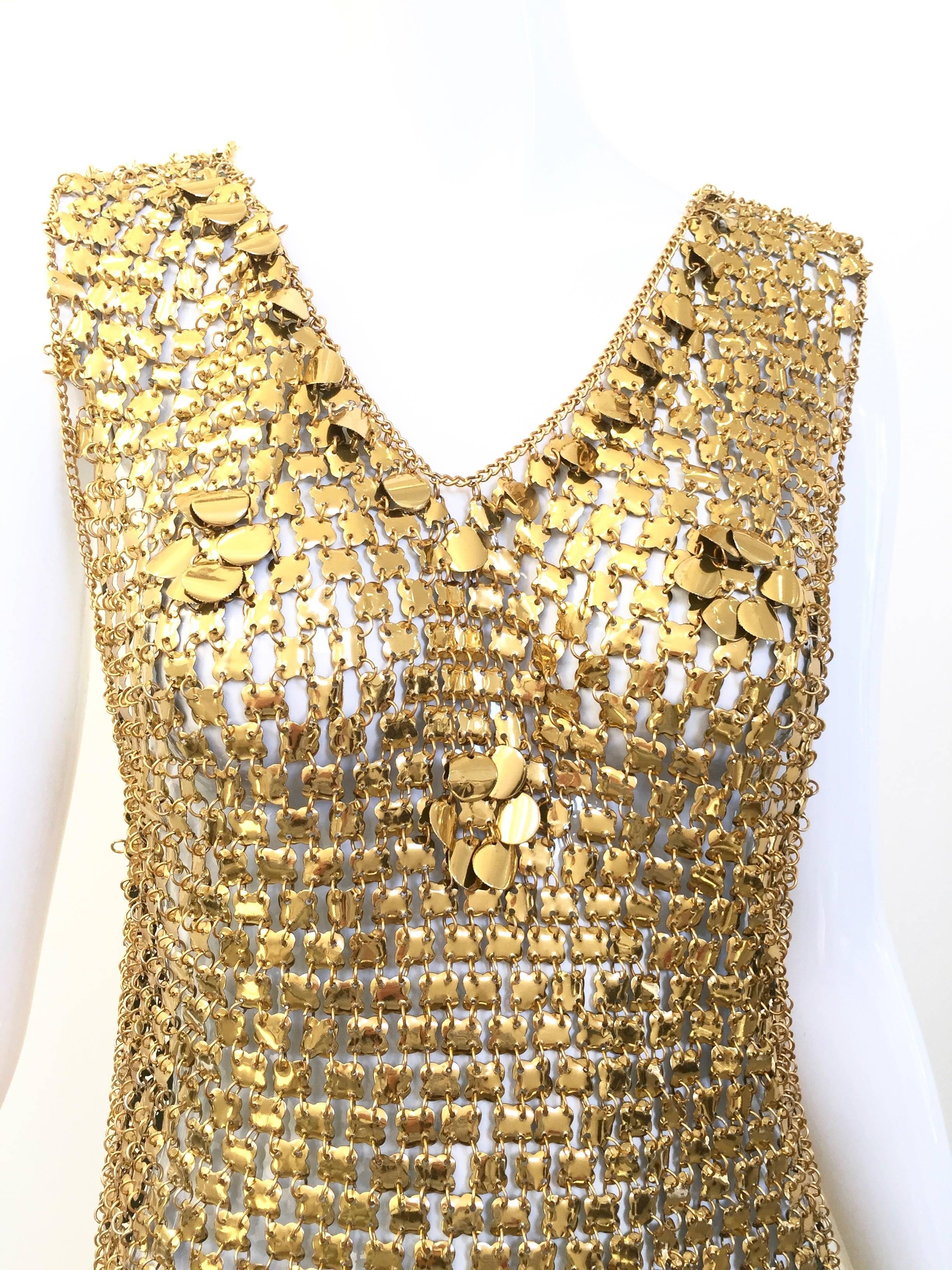 1970s Paco Rabanne gold chain mail dress.
In excellent condition.

Fit size 4 