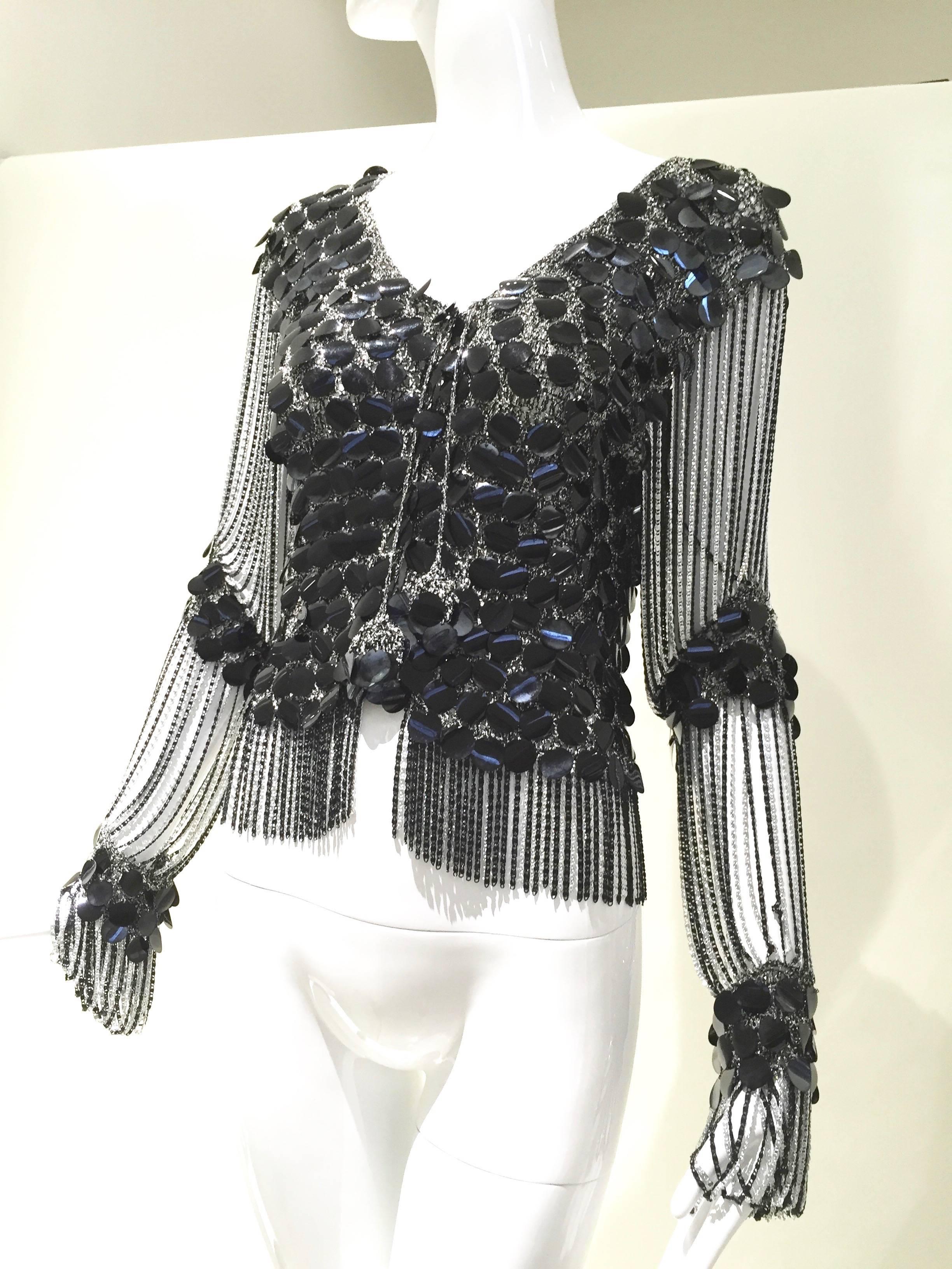 1970s LORIS AZZARO black tassel chain mail and sequin pailette knit cardigan.
Bust : 34