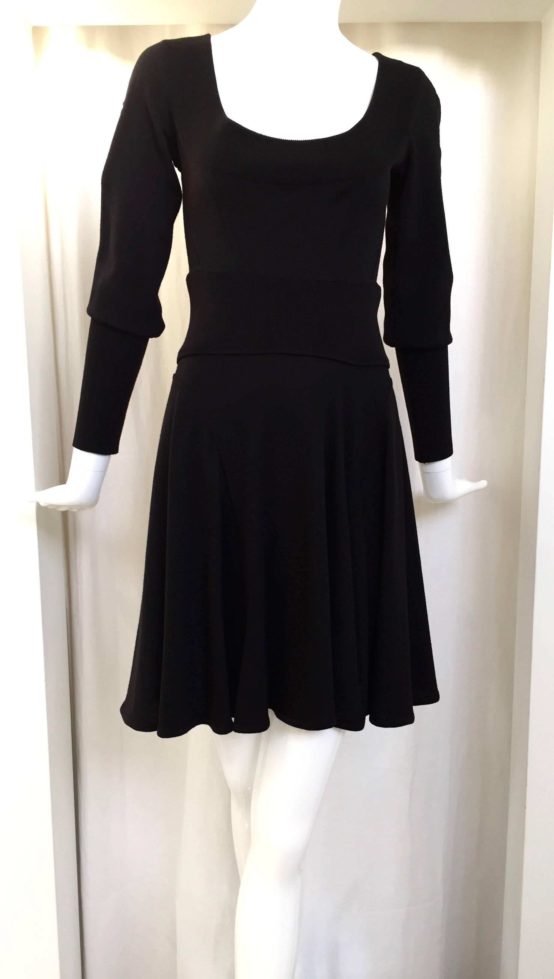 80s Black ALAIA sweater dress in skater style. scoop neck. knit wool. 
Size : 4/6 small to medium
Bust: 34