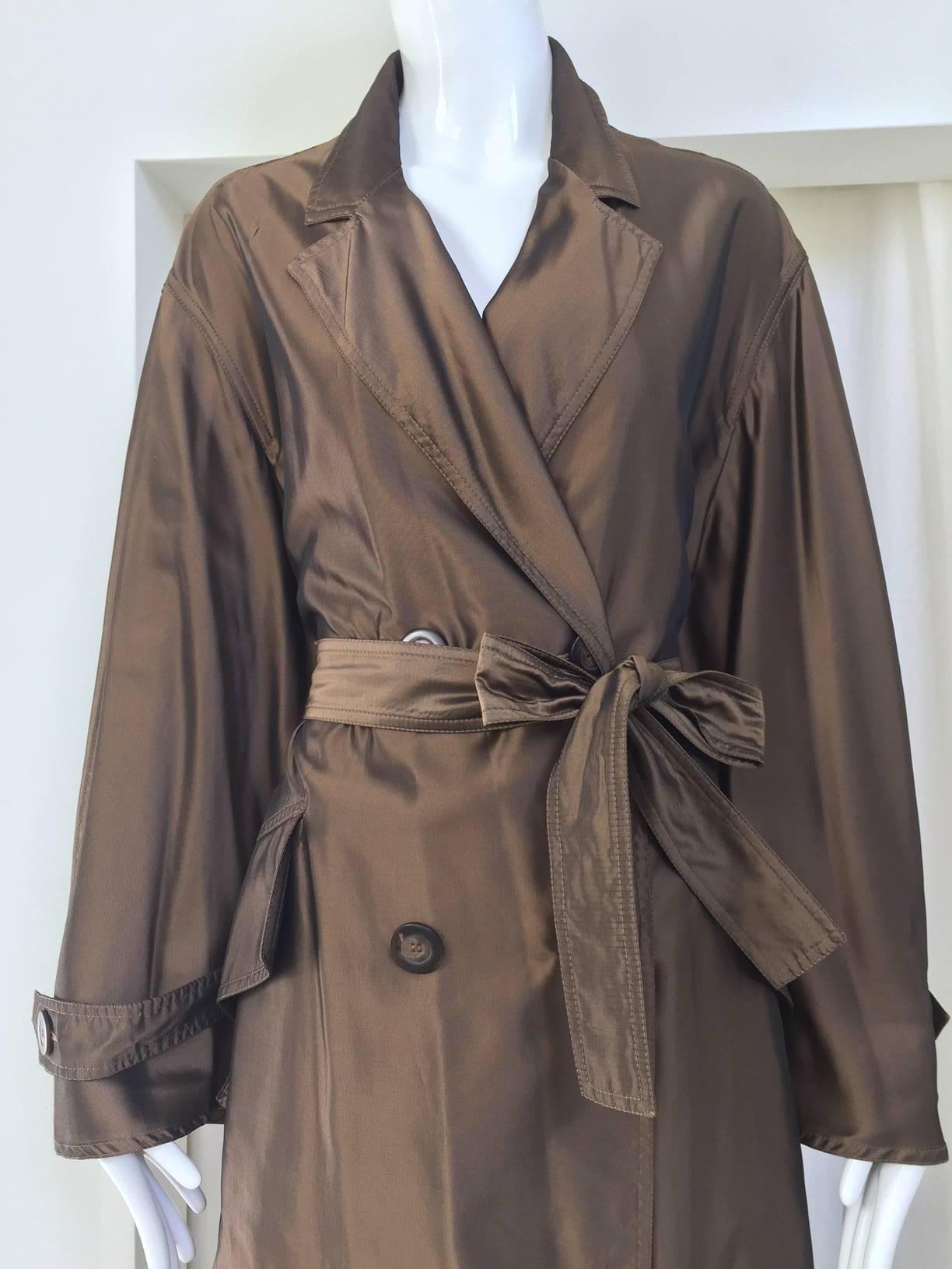 1980s KRIZIA POI bronze silk light trench coat.
Double breasted with sash.
Fit size 2/4/6/8
 