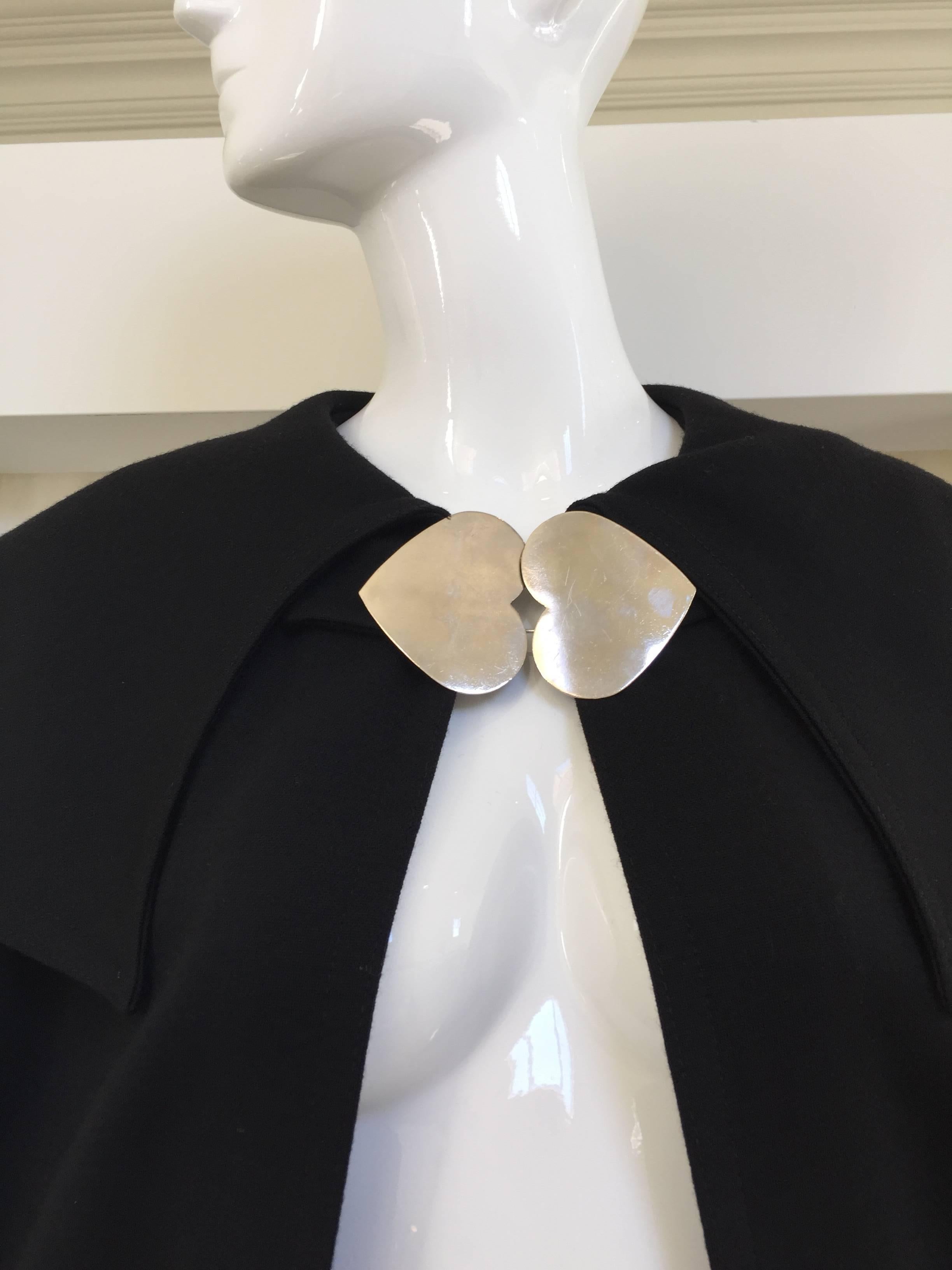Black Knit cape with heart metal clasp, 1960s  In Good Condition In Beverly Hills, CA