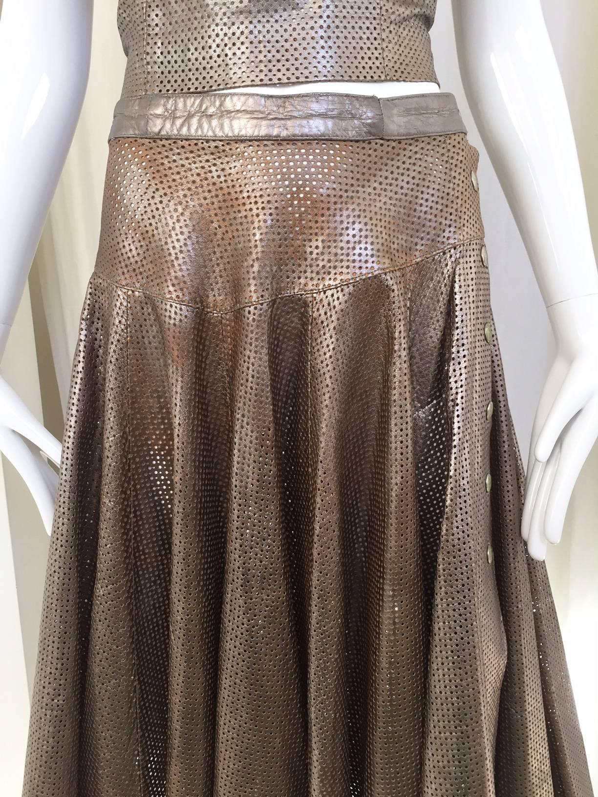 1980s Ted Lapidus bronze metallic perforated spaghetti strap top and skirt.

Top measurement:
Bust: 36