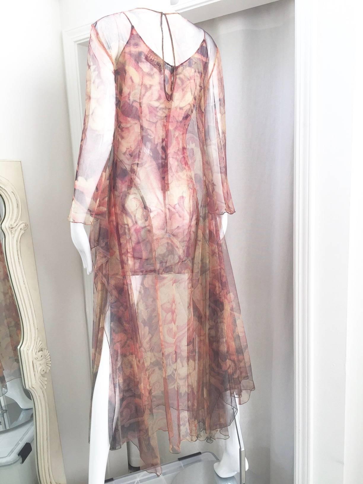 Gianfranco Ferre silk spaghetti strap silk mini dress with netting nylon sheer cover.
slip measurement;
B; 32