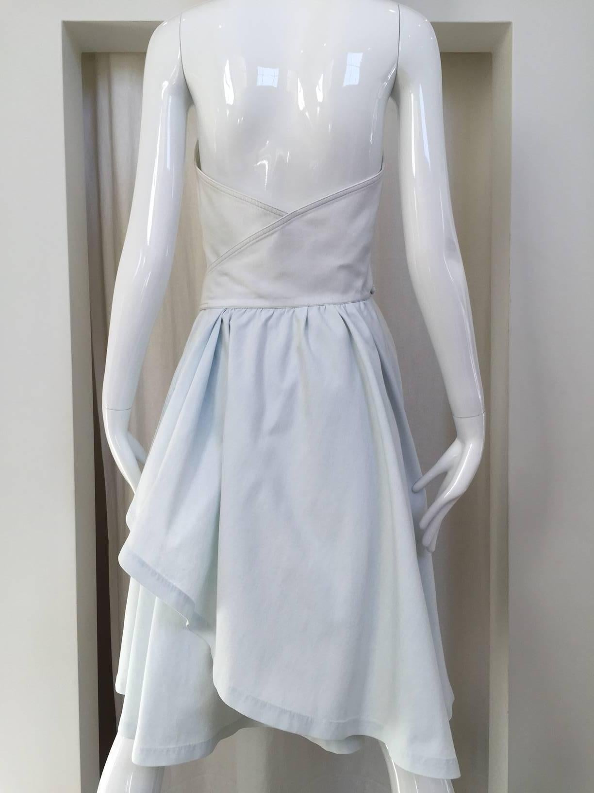 1990s Thierry Mugler light aqua blue cotton wrap dress.
Size: 4-6
Bust: 34
Waist is adjustable from 26