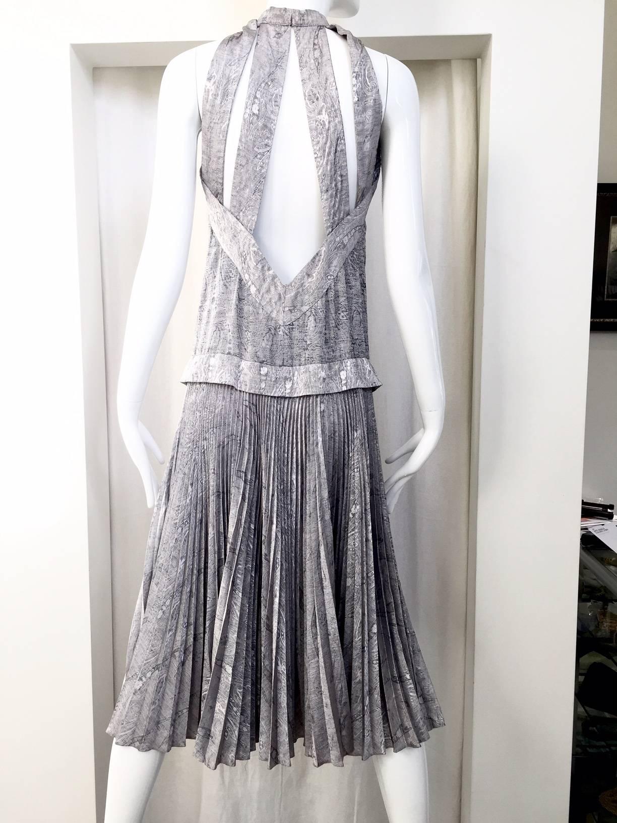1970s Ted Lapidus grey silk plissè halter summer dress with panel at the back. 
drop waist style.
Bust: 34
Waist: 30"
small - medium