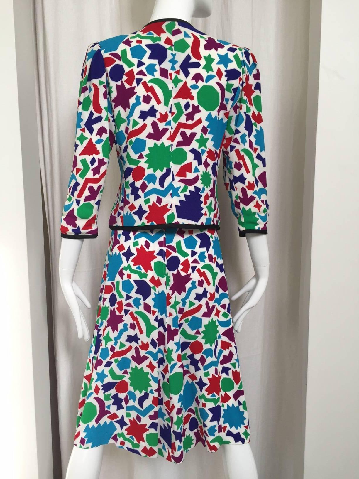 Vintage 70s Yves Saint Laurent blouse skirt set ensemble print in turqoise, red, green and purple color  tribute to Henri Mattise.  V neck 3/4 sleeve buttoned blouse and A line pleats knee length skirt. Perfect for summer casual party dress. Size: