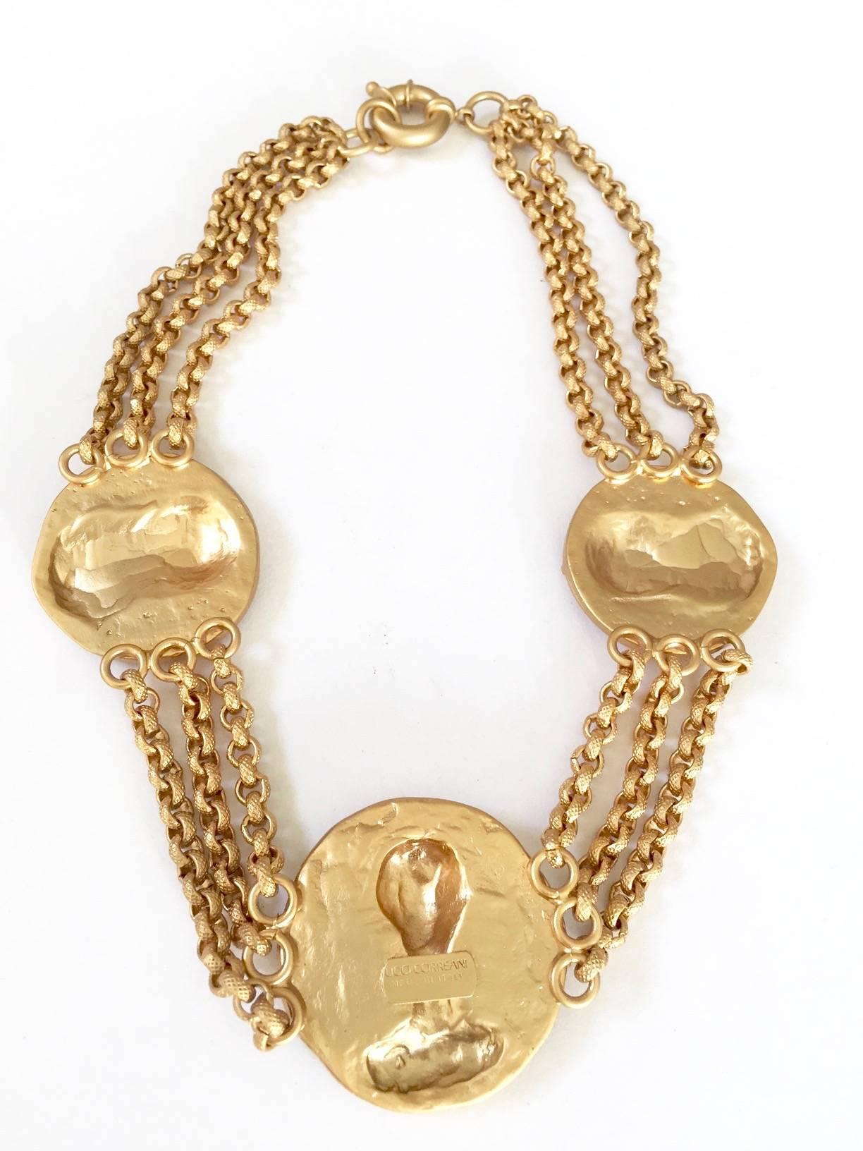 1980s Gianni Versace triple romanesque medallion gilded metal necklace by Ugo Correani.
Measurement:
chain: 17