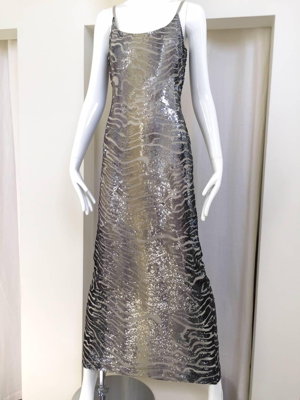 1990s vintage Giorgio Armani silver and gray sequin spaghetti strap cocktail dress.
Bust: 32