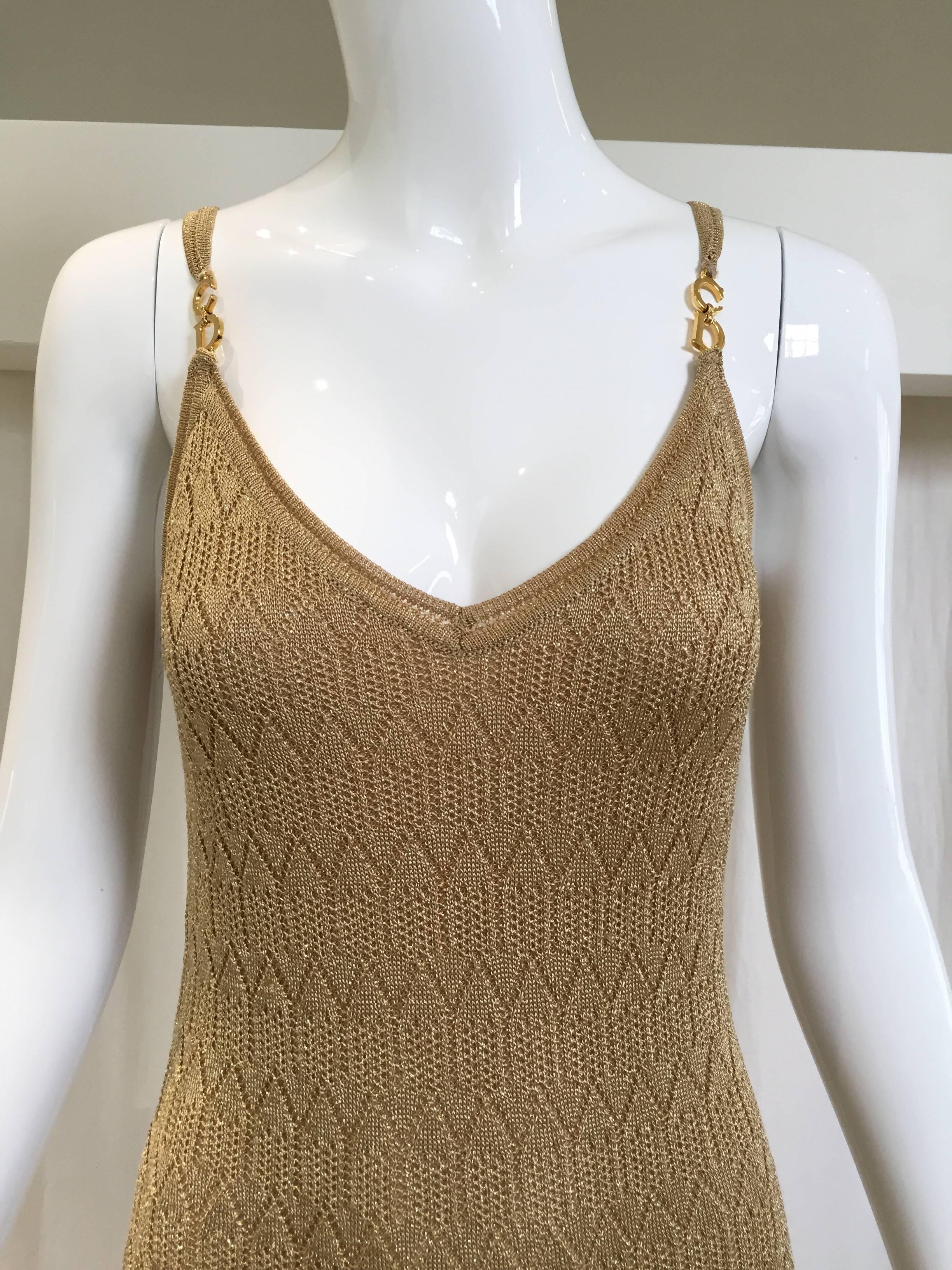 Vintage Christian Dior by john galliano gold metallic knit dress from 1990s. 
Bust: 32"/ Waist: 27"/ hip: 32"
Dress is stretchy . Fit size 2/4/6
