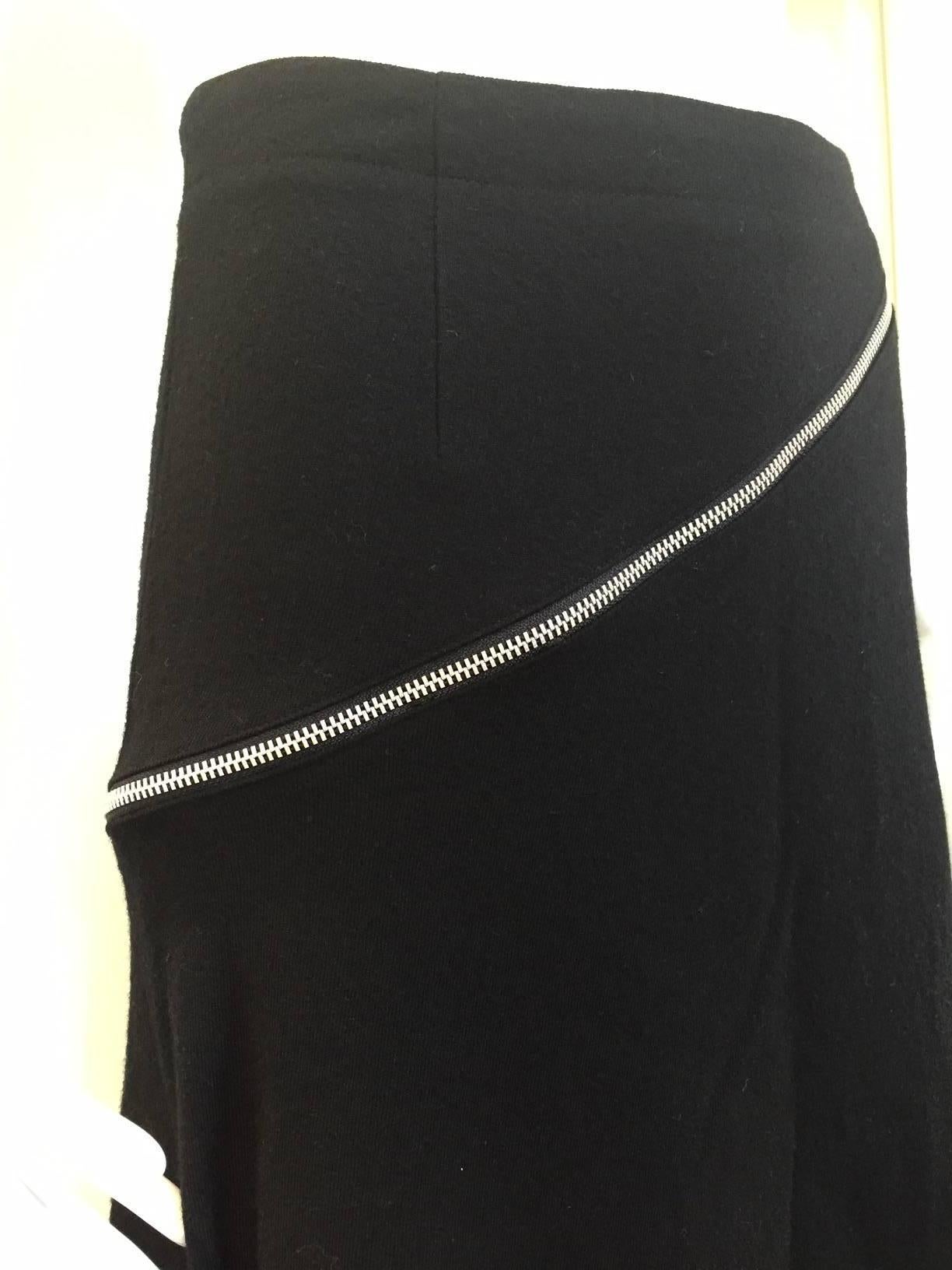 2000s Comme des garcons black wool diagonal zipper skirt.
Waist: 25