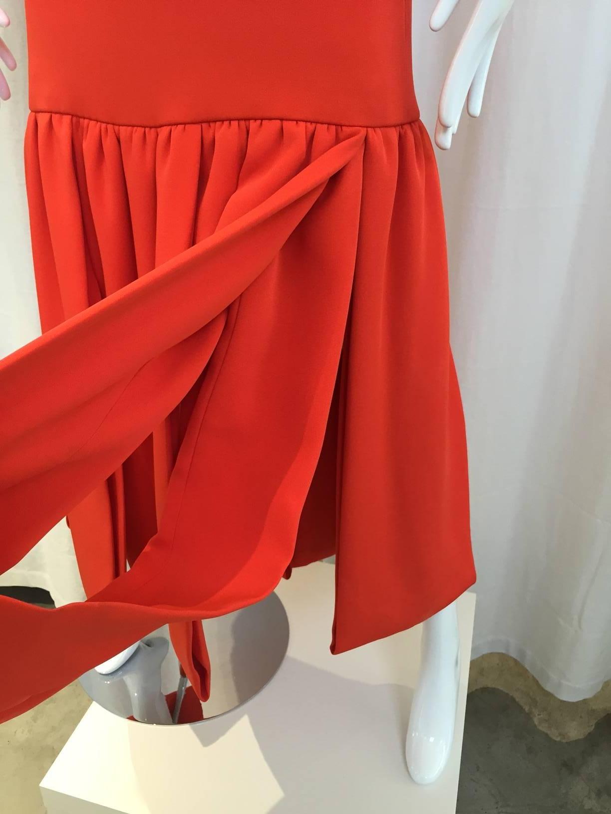 Pierre cardin orange silk dress. Size: 6
Shoulder: 14inches; 
Bust: 36 inches/ waist: 36