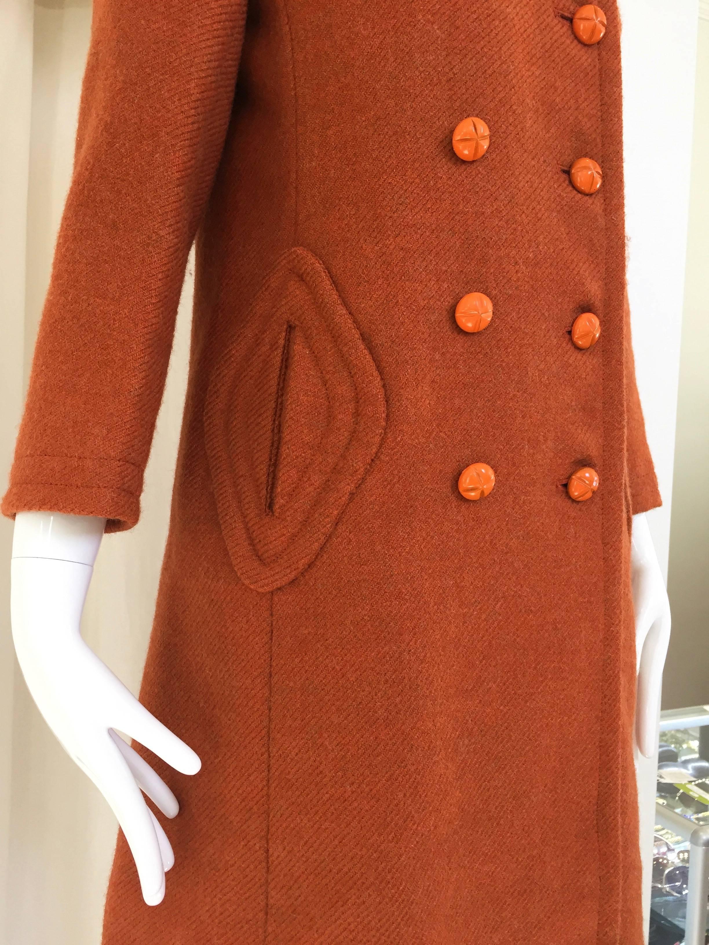 70s Pierre Cardin burnt orange wool pea coat.
Bust: 35