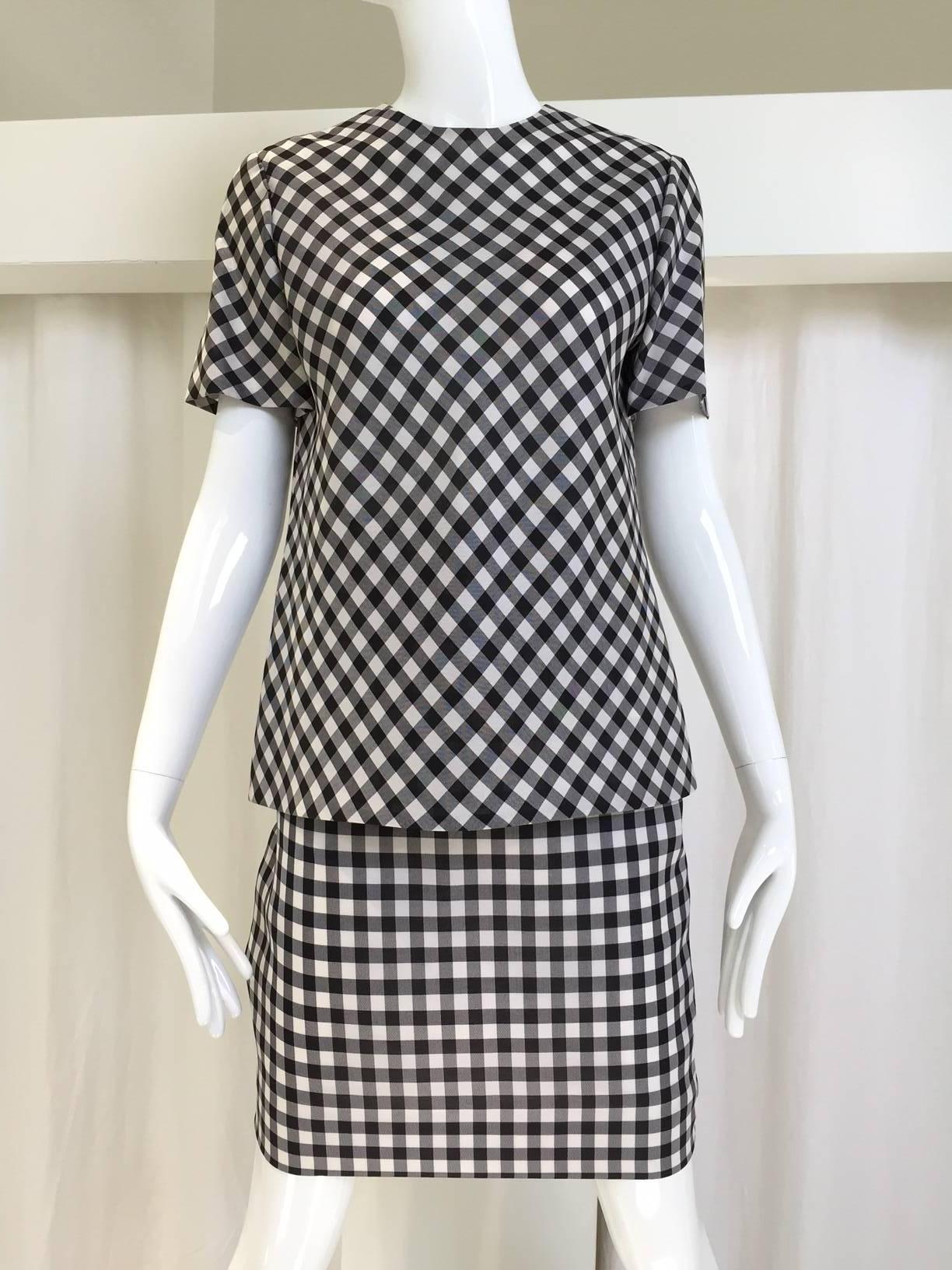 1980s Vintage Bill Blass black and white plaid silk  jacket, blouse and skirt set. 
Size: Medium
Jacket: Bust: 44", Waist: 44" / Sleeve: 21" (tent style)  fit size 6/8
Blouse/top:  Bust: 37"/  Waist: 36" / Hip: 37" (