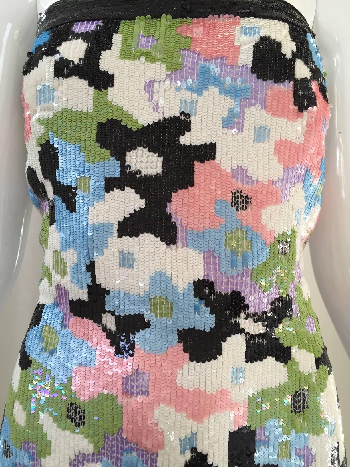 Fun Escada strapless cocktail dress in black, pink, green and blue sequin floral Phychedelic print
Bust: 36