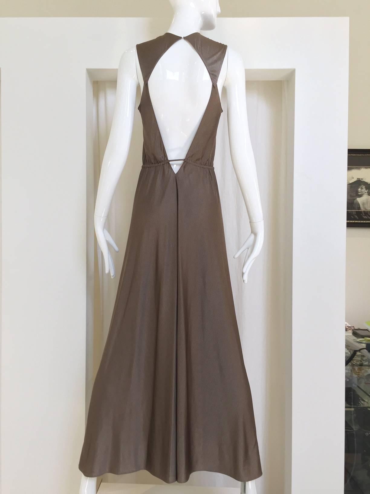 1990s Geoffrey Beene silk jersey open back bronze sleeveless gown. elastic waist. Size: 2/4 
B: 32