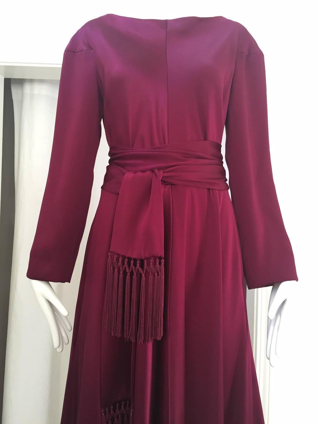 Beautiful 1970s Jean Patou Silk Charmeuse in Red Plum with long sash.
Bust: 38