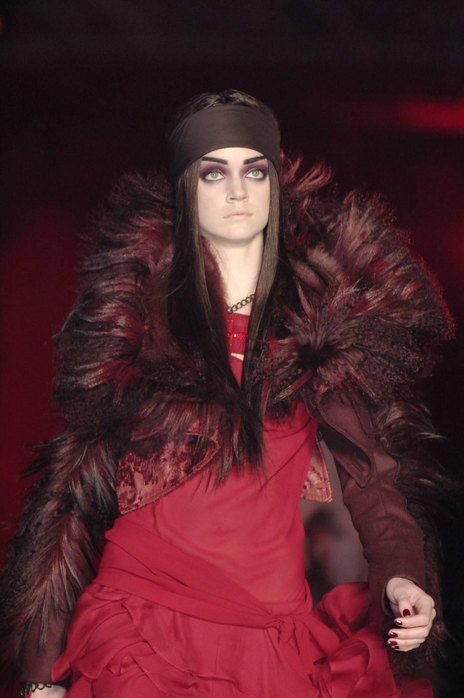Beautiful ox blood wool and mongolian fur crop jacket designed by John Galliano for Dior. 
Bust: 36