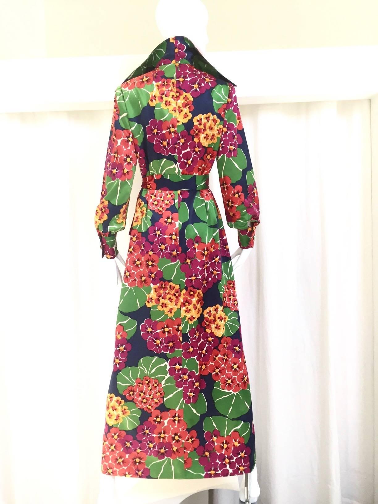 Vintage 1970s Geoffrey Beene hippie floral print silk twill shirt maxi dress in vibrant color in fuschia, purple, blue, green and yellow. Dress is lined in blue silk. 
 size: 6/8 Medium
Bust: 38"/ Waist: 36"/ Hip: 40"/Length: 56"