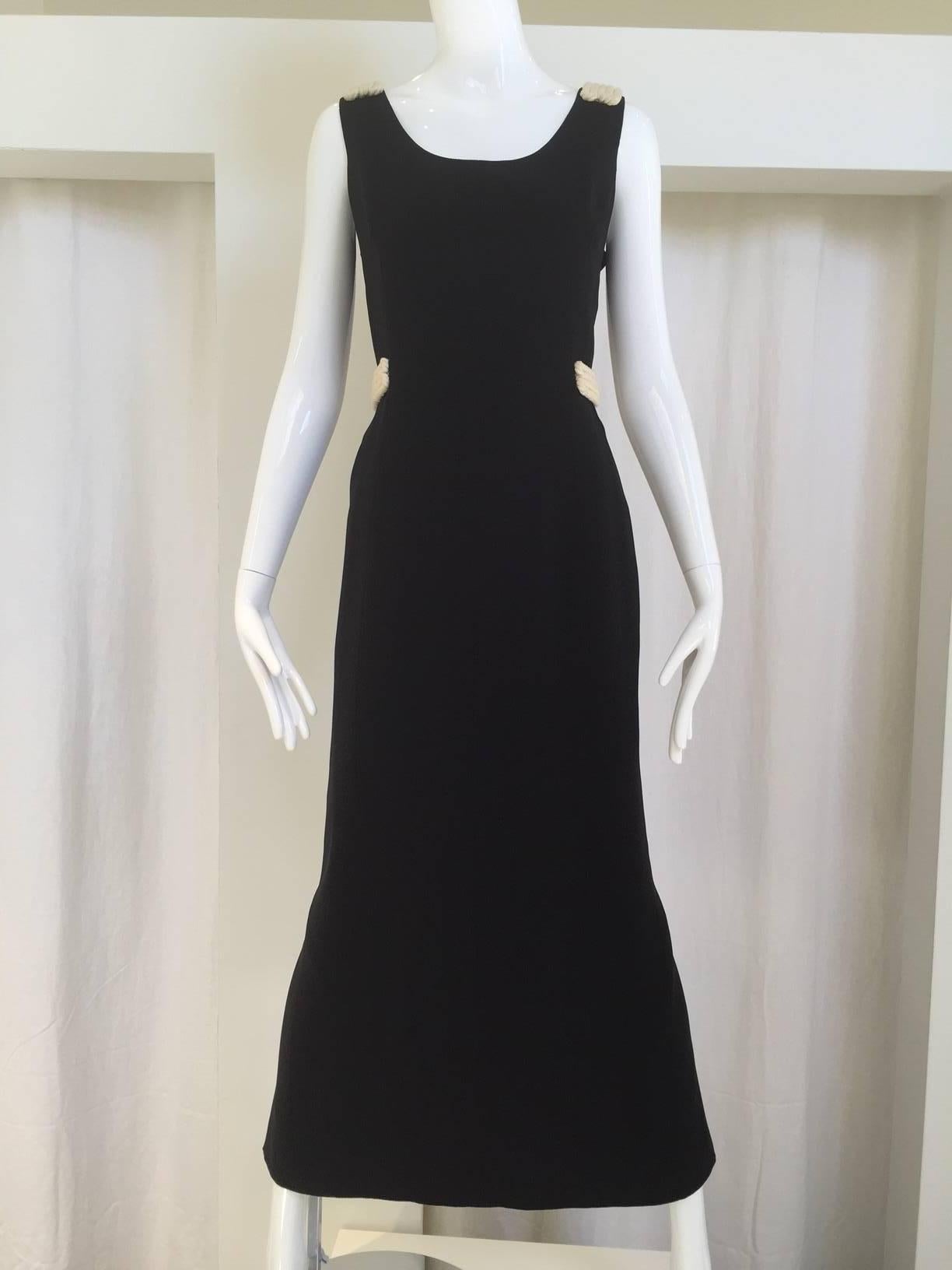 90s Gianfranco Ferre black silk dress with rope attached to waist and strap. This dress marked 44 but it is fit modern 4
Bust: 34