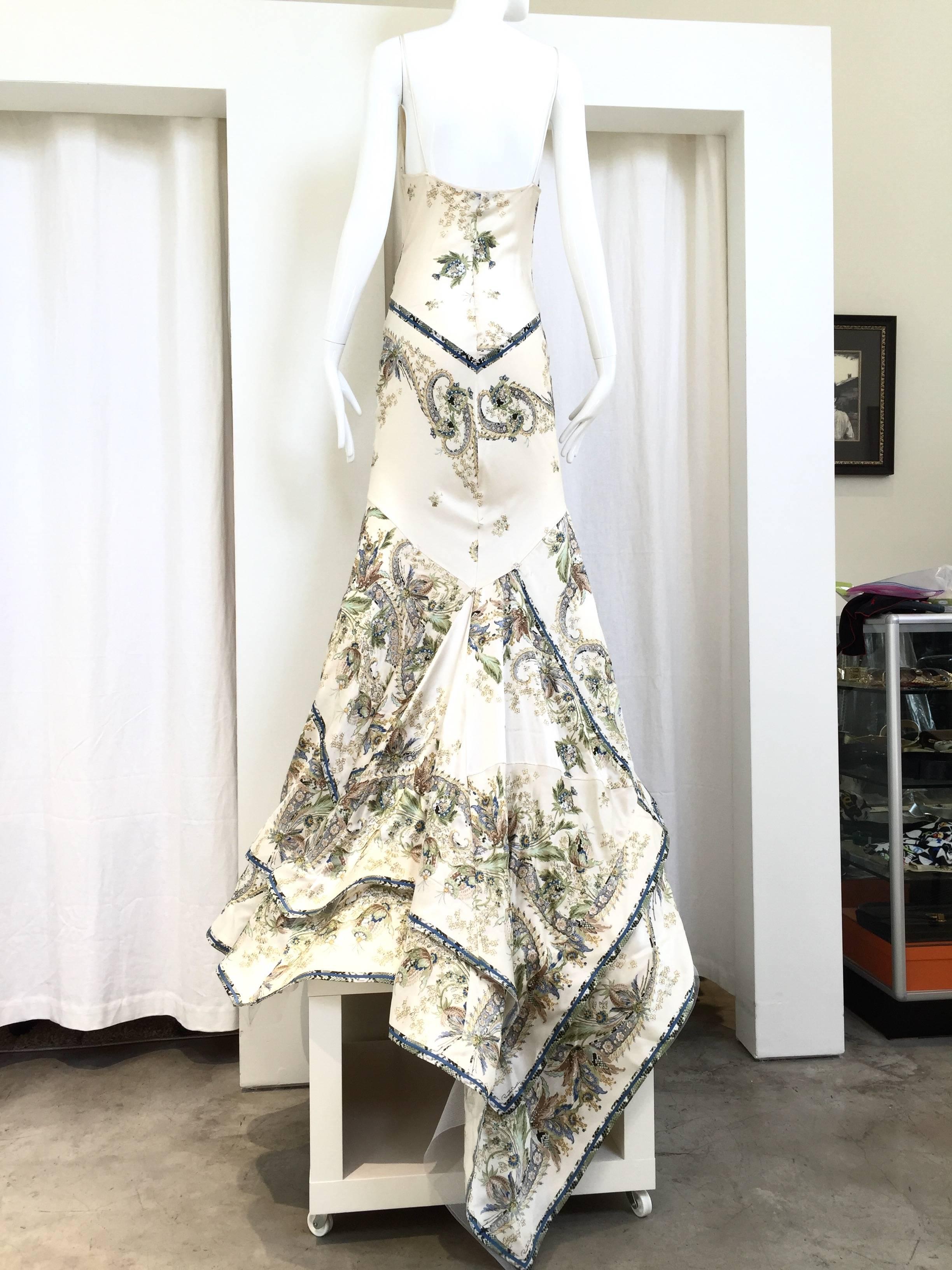 Beautiful Roberto Cavalli bias cut off white silk charmeuse print gown with blue, green, brown floral and  gold metallic butterfly and floral baroque print. Perfect Wedding Gown. 
Fit Best US modern 2/4/6 Small - Medium

Bust: 34