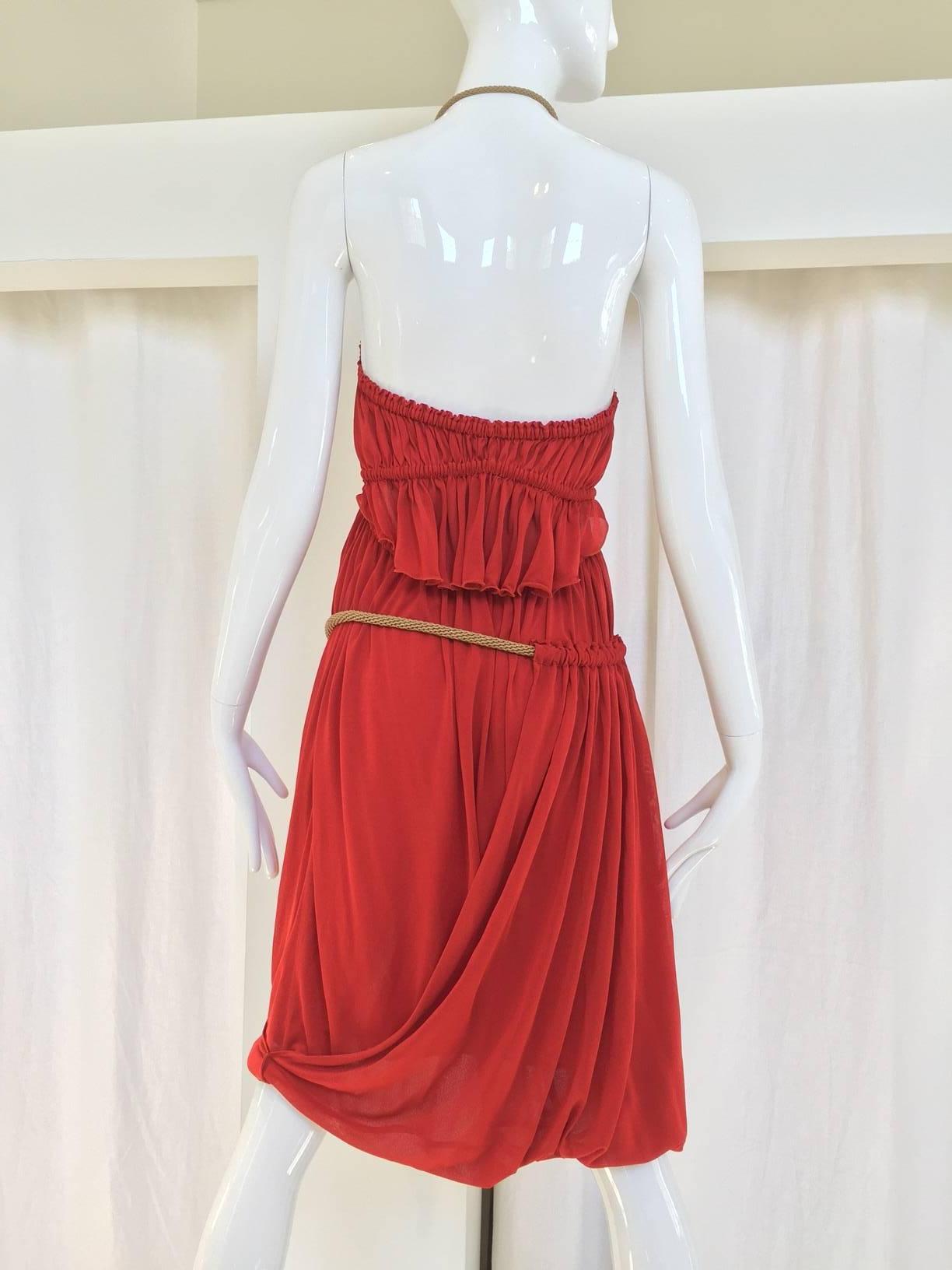 Yves Saint Laurent by Tom Ford red knit V dress halter dress with rope sash ties to neck. Grecian inpired
Size: Small -  Medium 
Bust: 34"/ HIp: 36". fit size 2/4/6