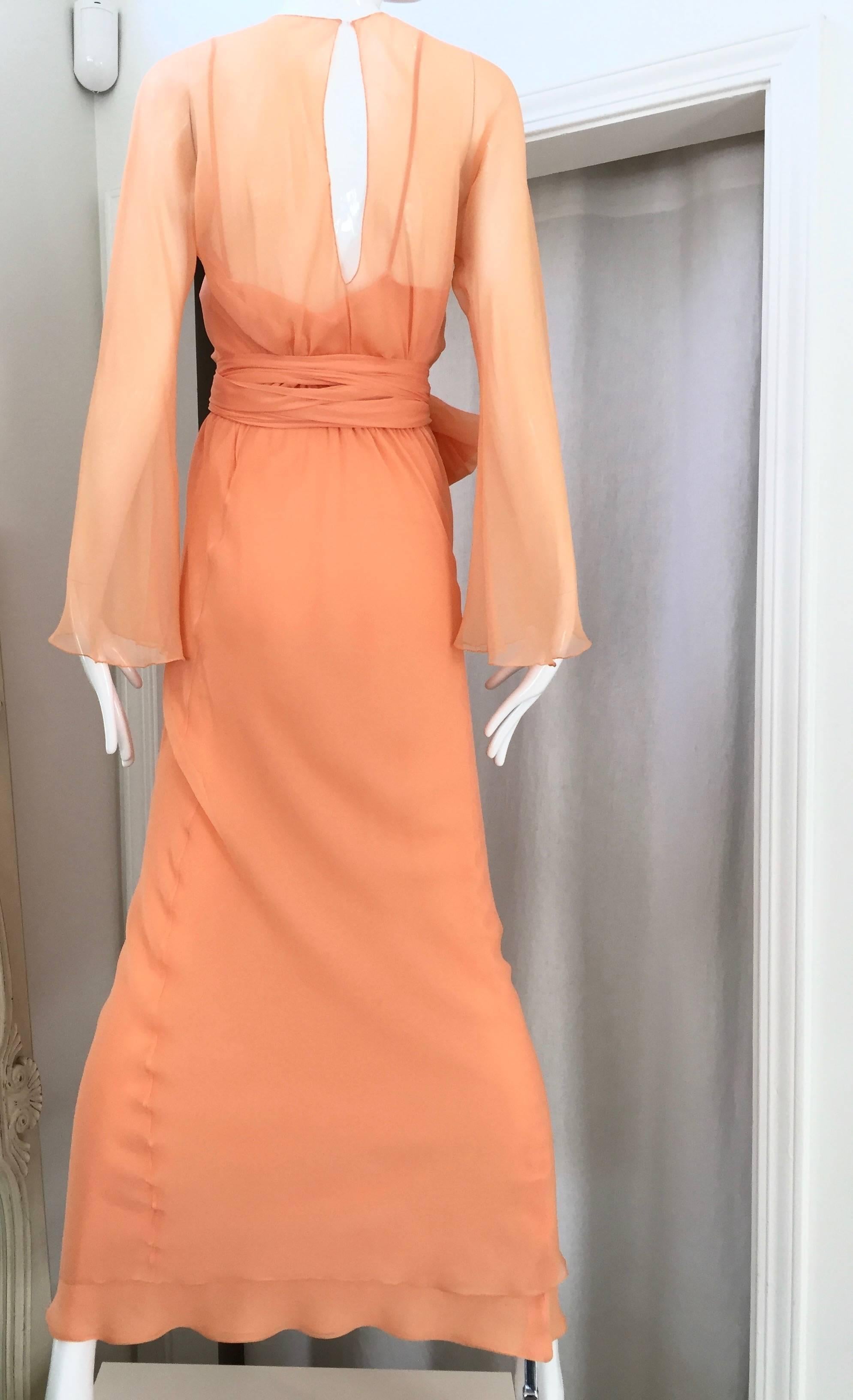 1970s 3 pcs  Halston Tangerine silk ensemble.( bias cut slip dress, long sleeve silk dress and long silk sash) 
Bust: 34"/  Hip: 34" 